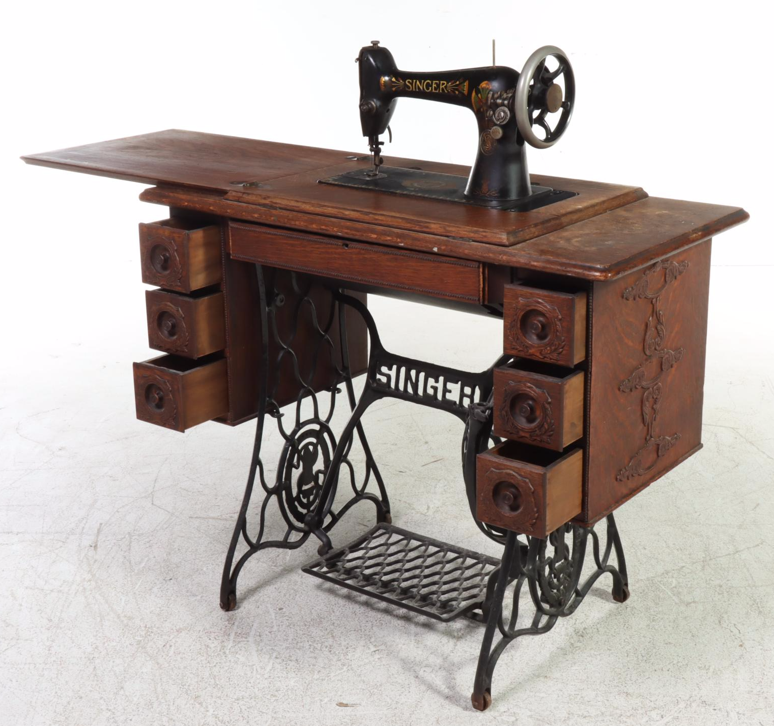 Singer Treadle-Wheel Sewing Machine with Oak and Iron Cabinet, Early 20th C.