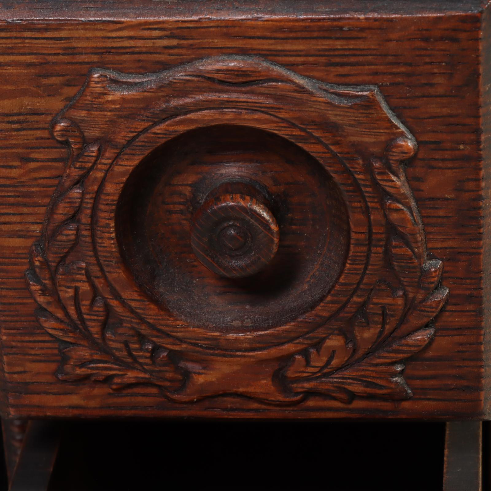 Singer Treadle-Wheel Sewing Machine with Oak and Iron Cabinet, Early 20th C.
