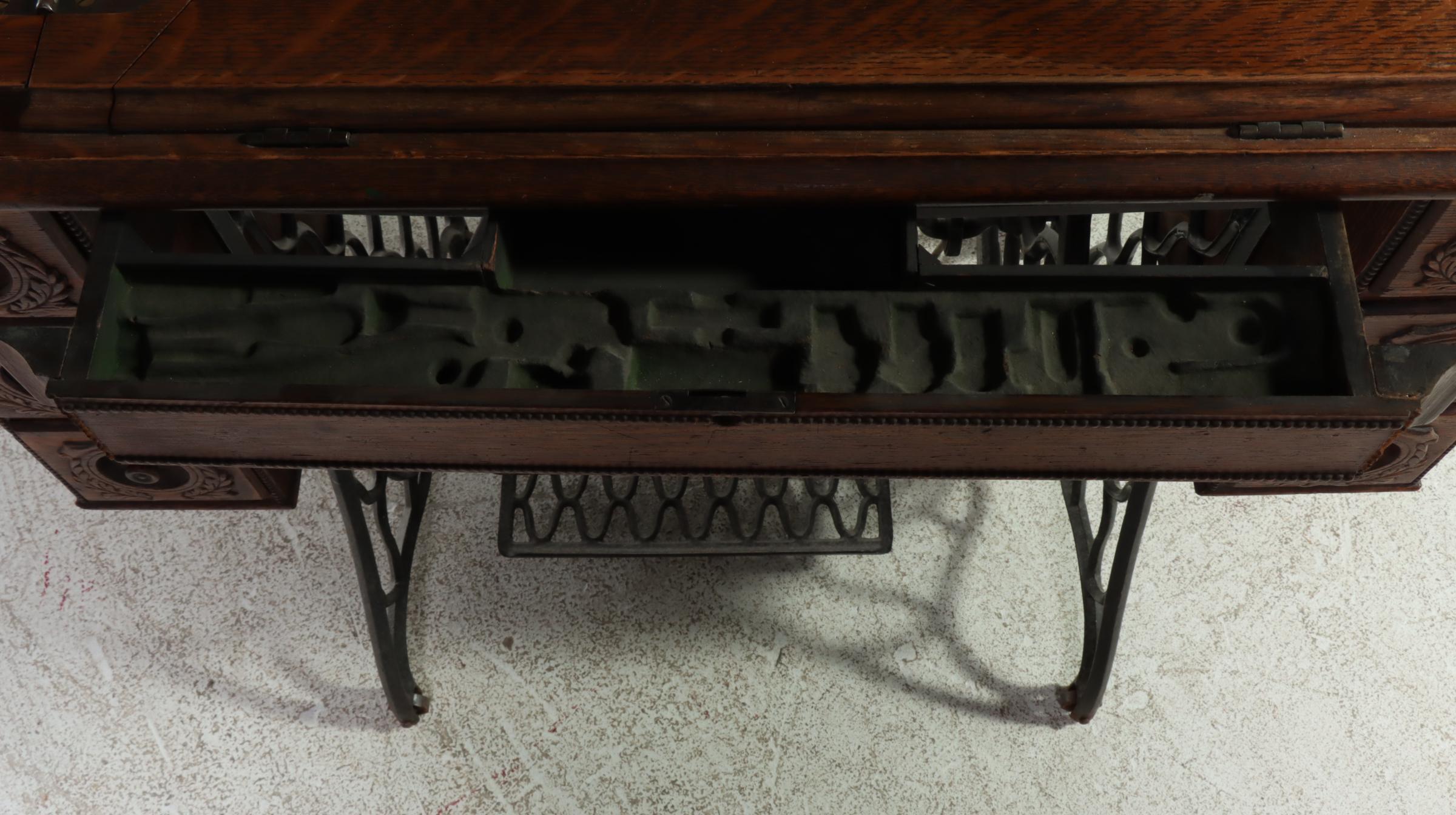 Singer Treadle-Wheel Sewing Machine with Oak and Iron Cabinet, Early 20th C.