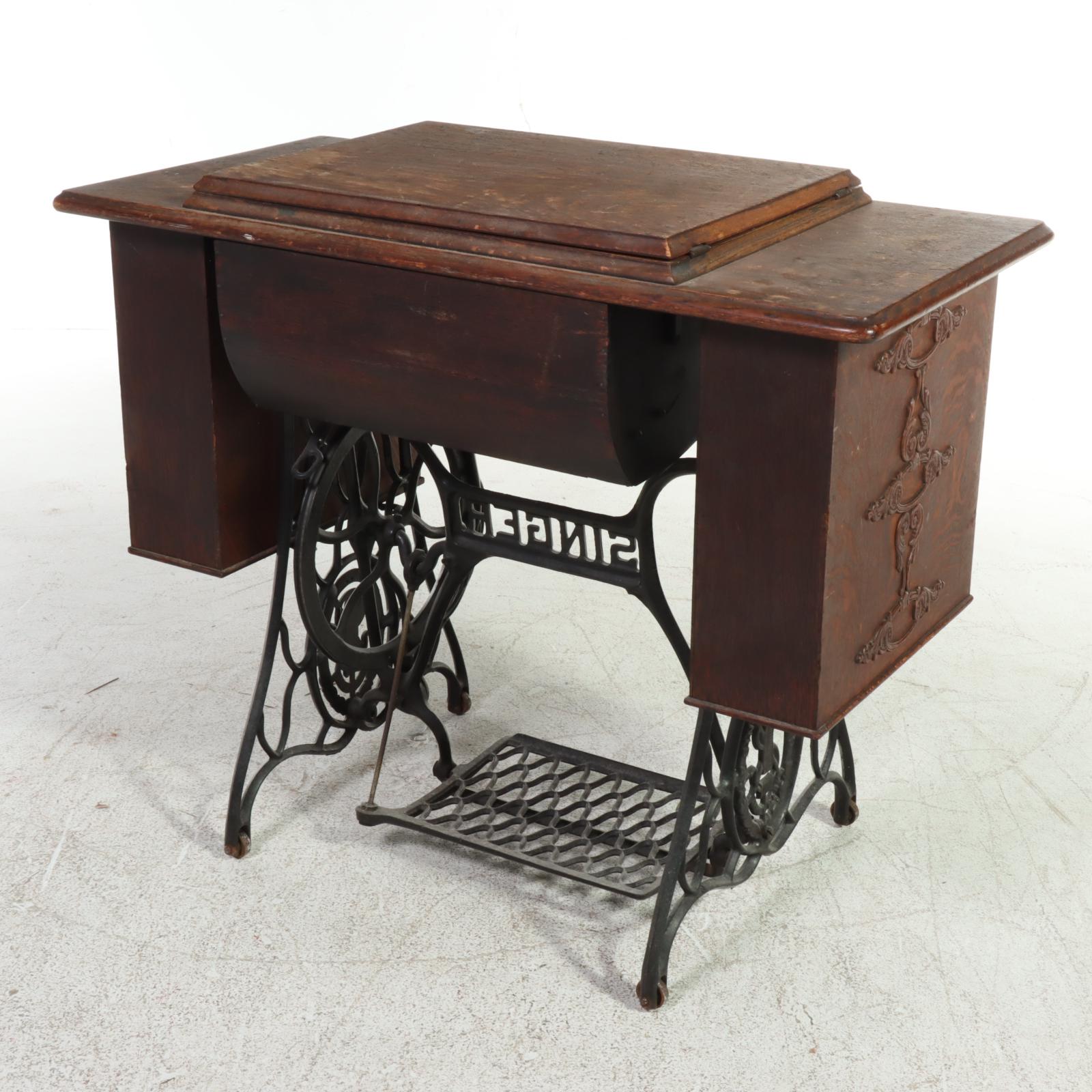 Singer Treadle-Wheel Sewing Machine with Oak and Iron Cabinet, Early 20th C.