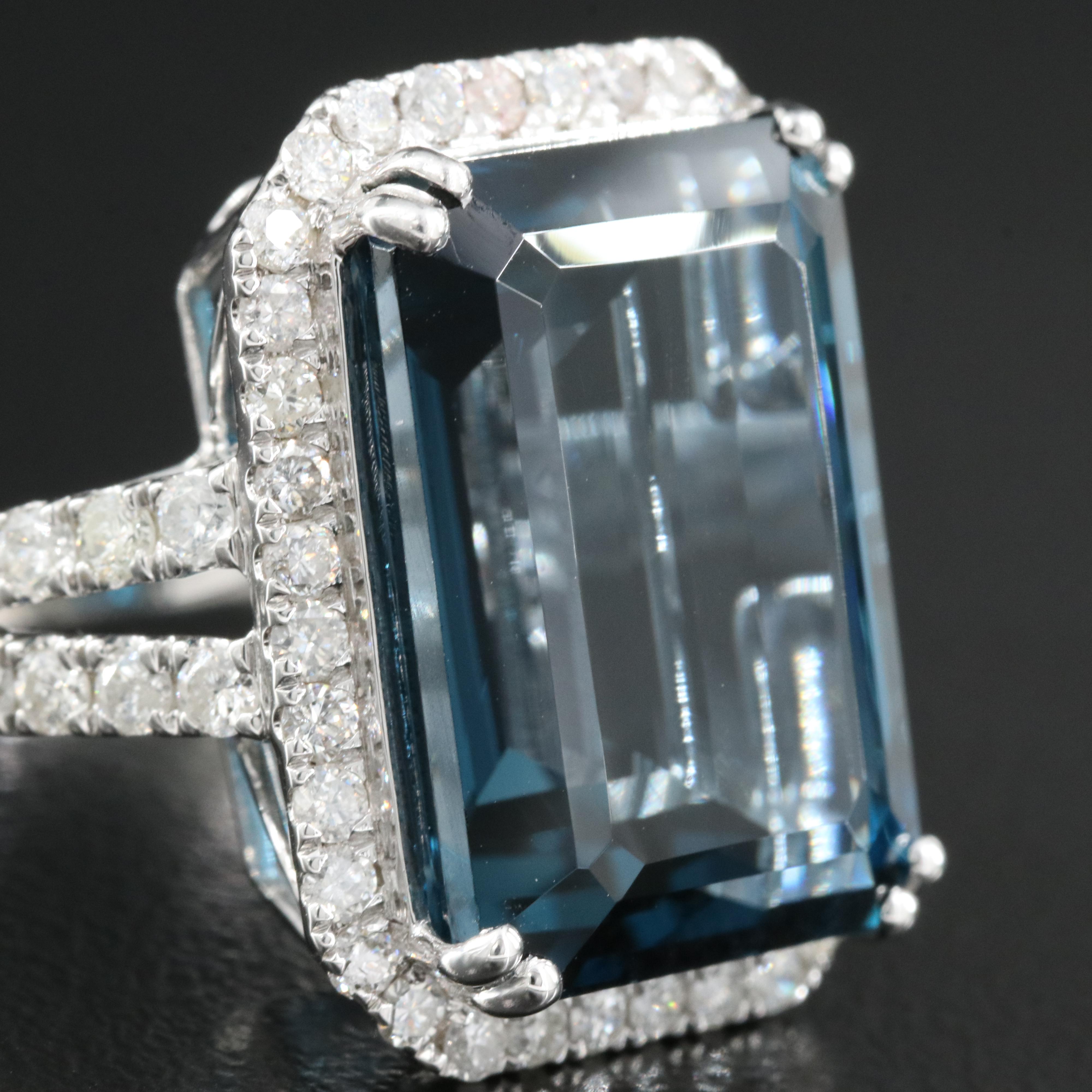 14K 21.18 CT London Blue Topaz and 1.35 CTW Diamond Halo Ring