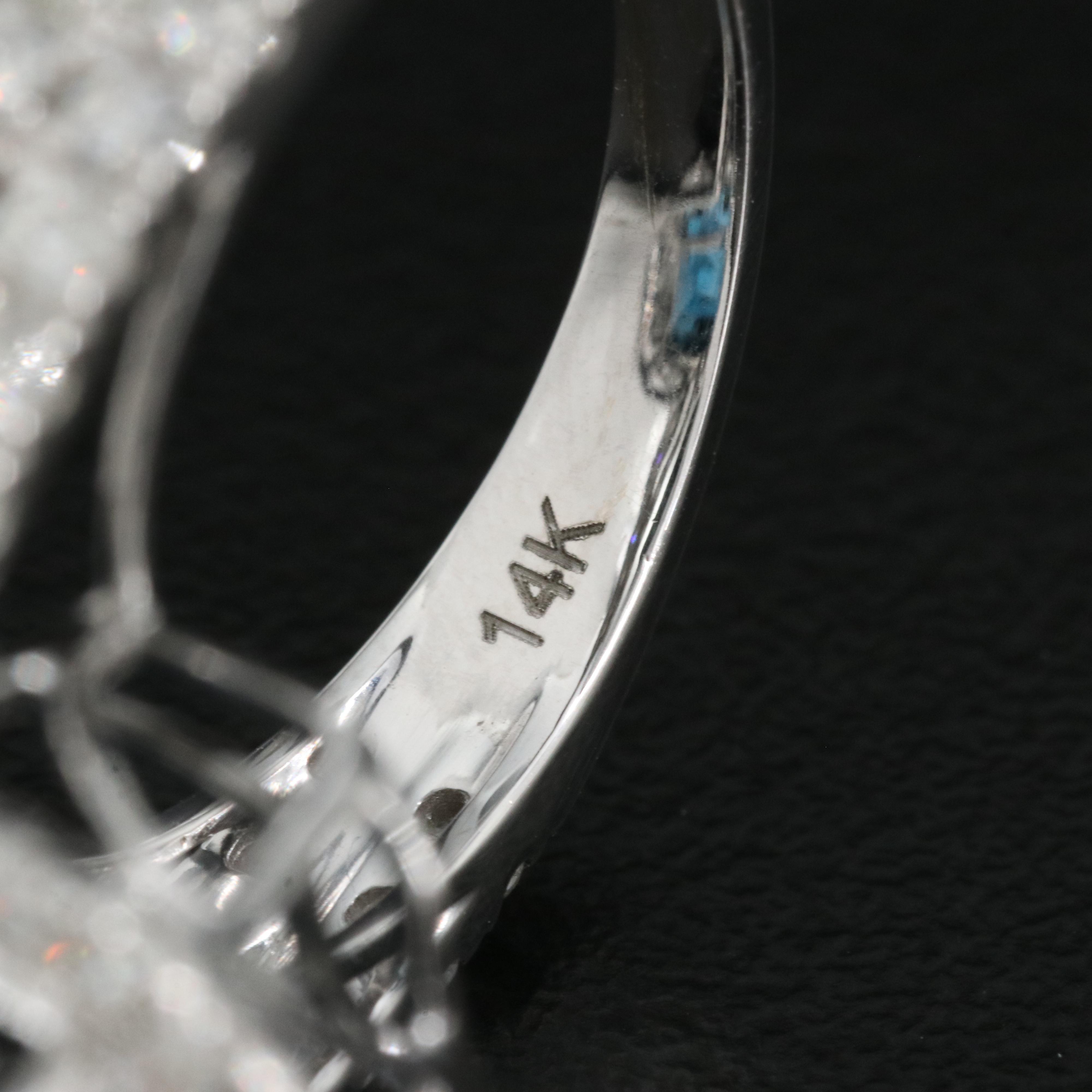 14K 21.18 CT London Blue Topaz and 1.35 CTW Diamond Halo Ring