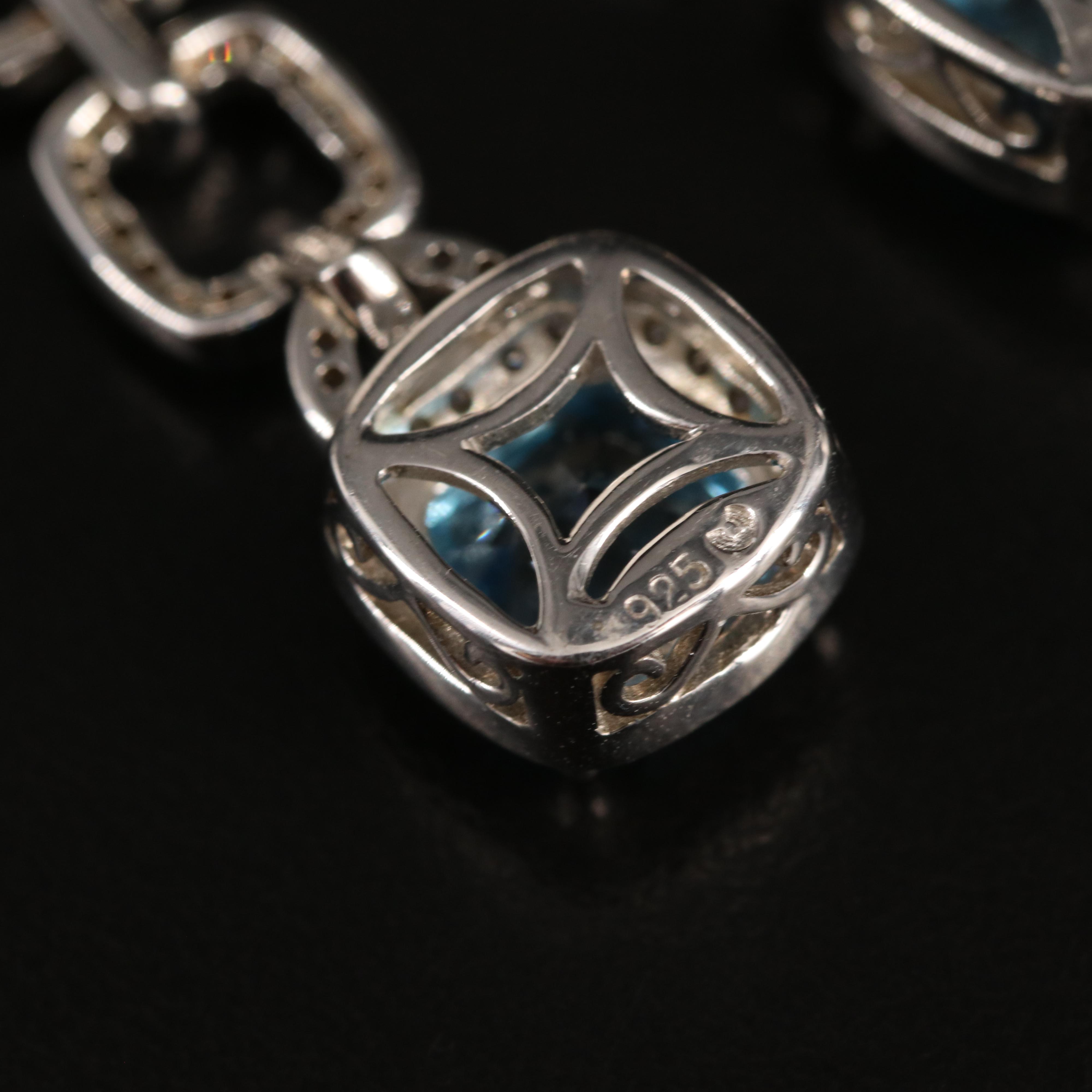 Sterling Swiss Blue Topaz and Diamond Earrings