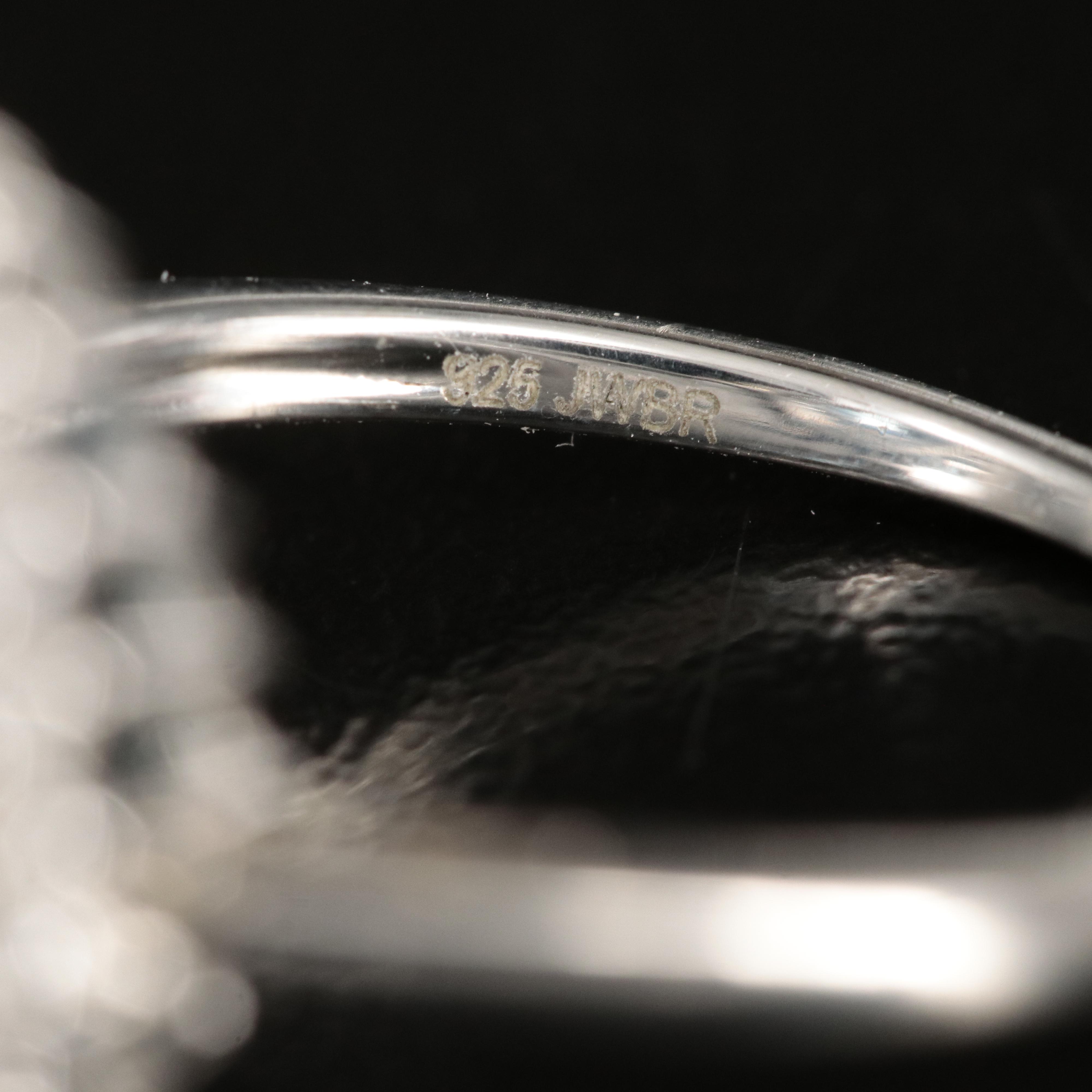 Sterling Swiss Blue and White Topaz Double Halo Ring