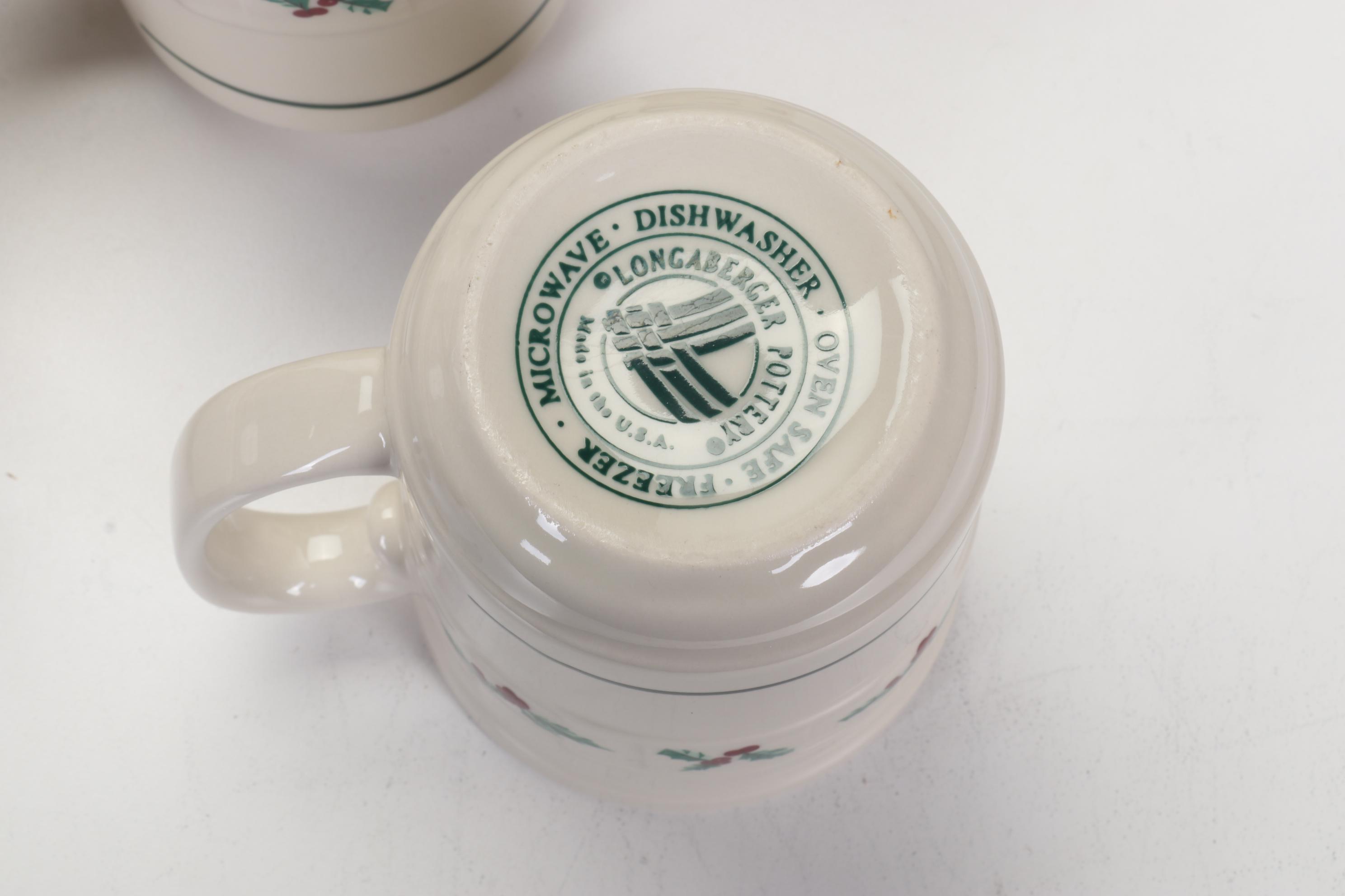 Longaberger Baskets with Pottery Christmas Mugs and Serving Pieces