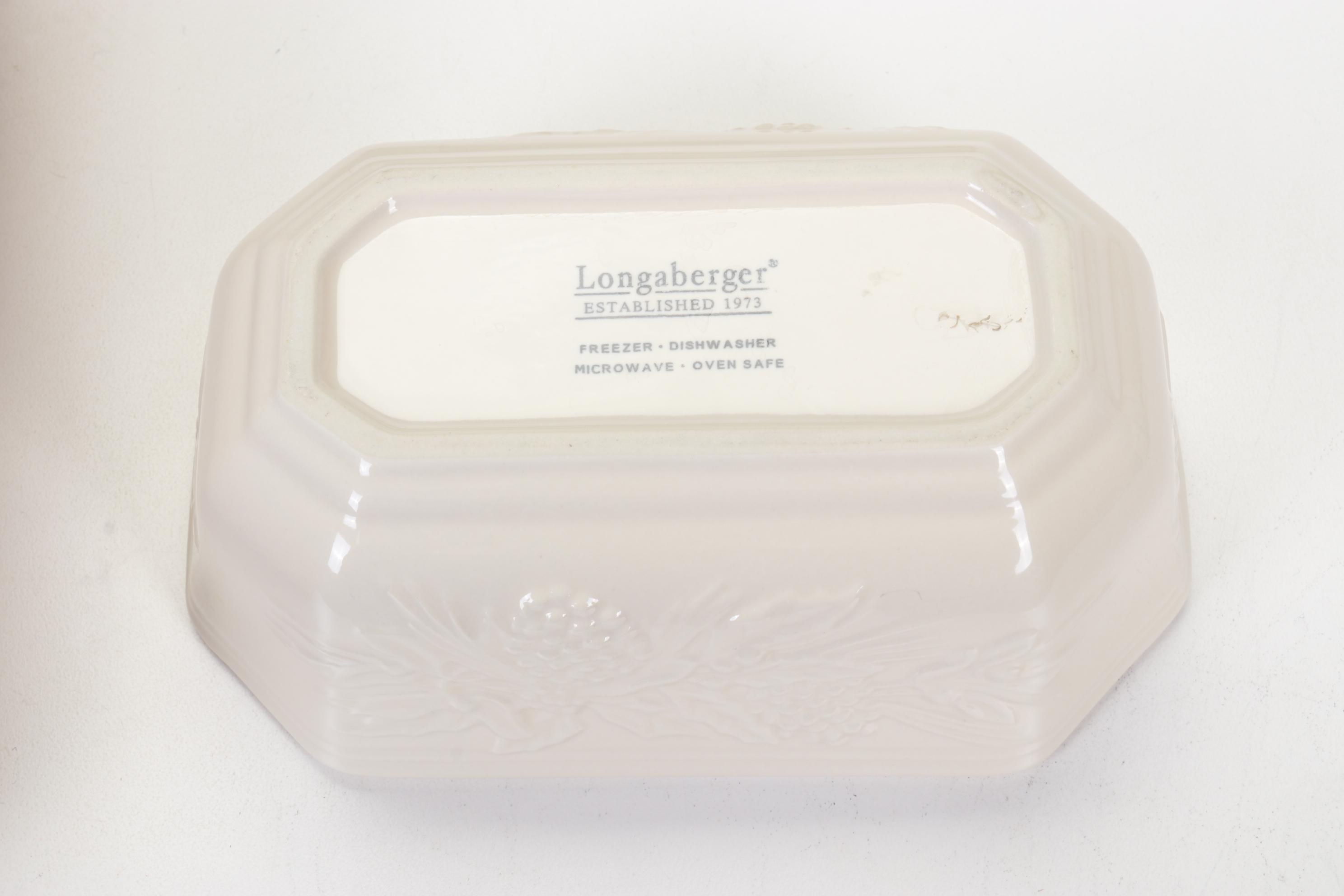 Longaberger Baskets with Pottery Christmas Mugs and Serving Pieces