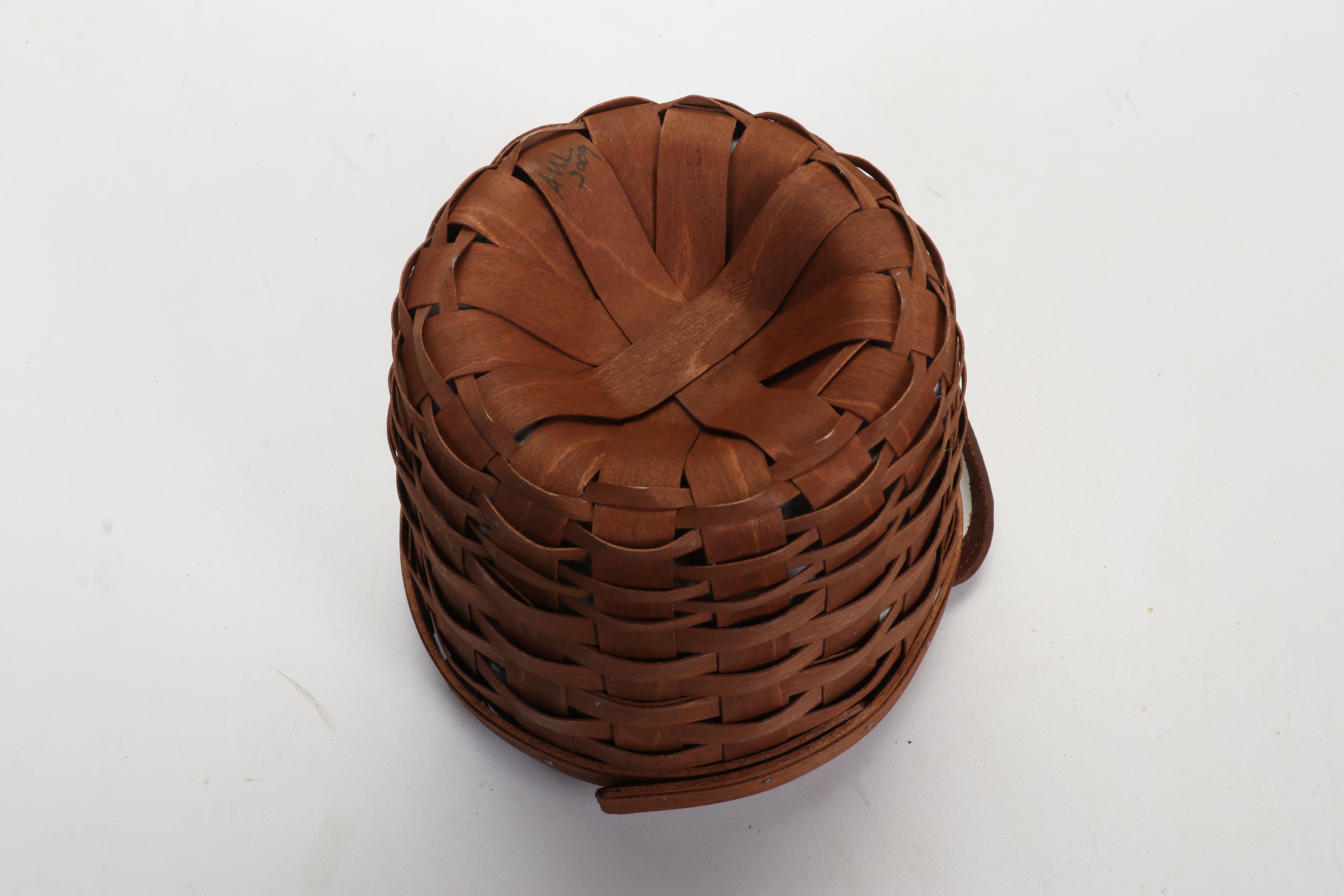 Longaberger Baskets with Pottery Christmas Mugs and Serving Pieces