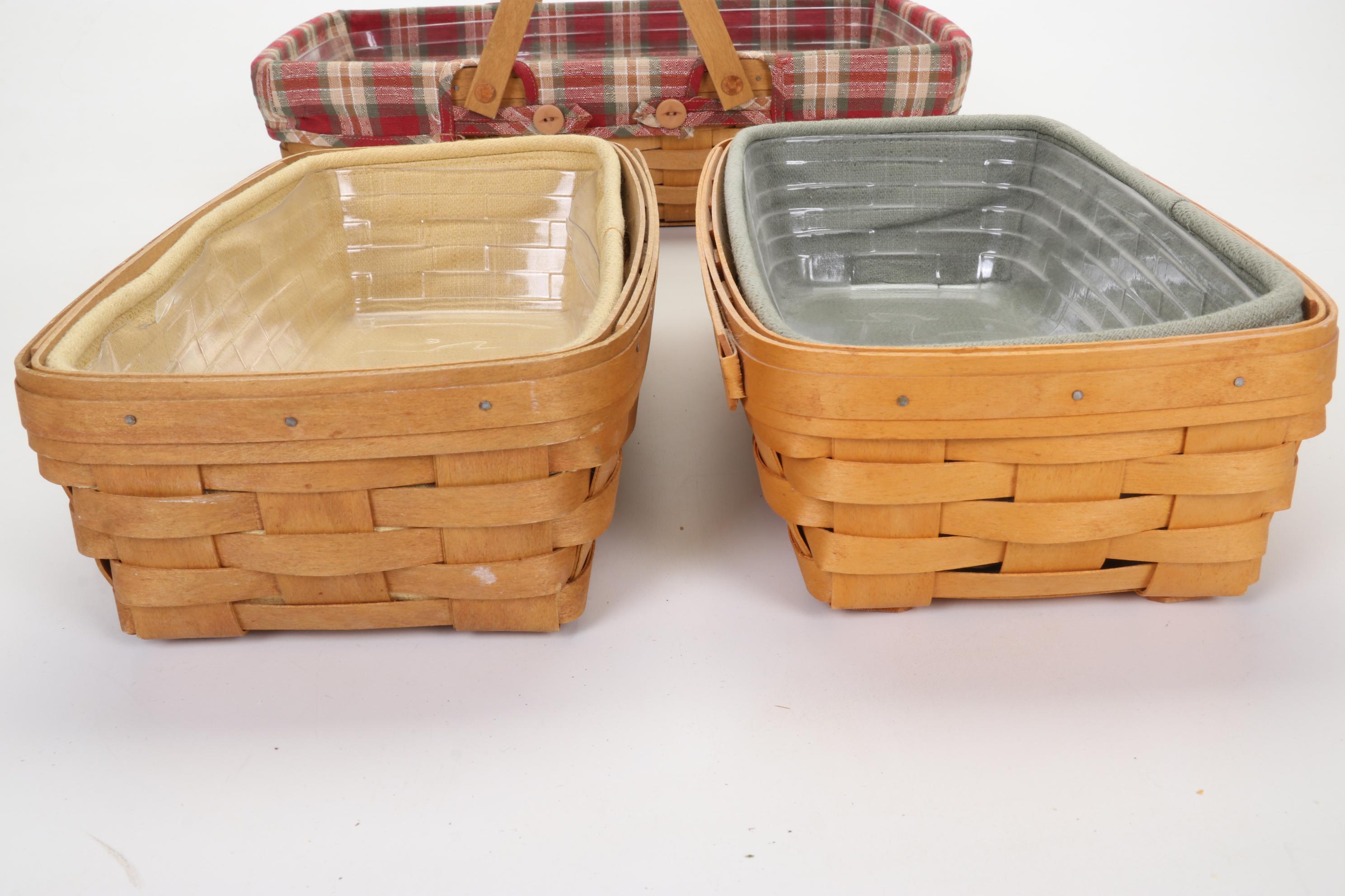 Longaberger Baskets with Pottery Christmas Mugs and Serving Pieces
