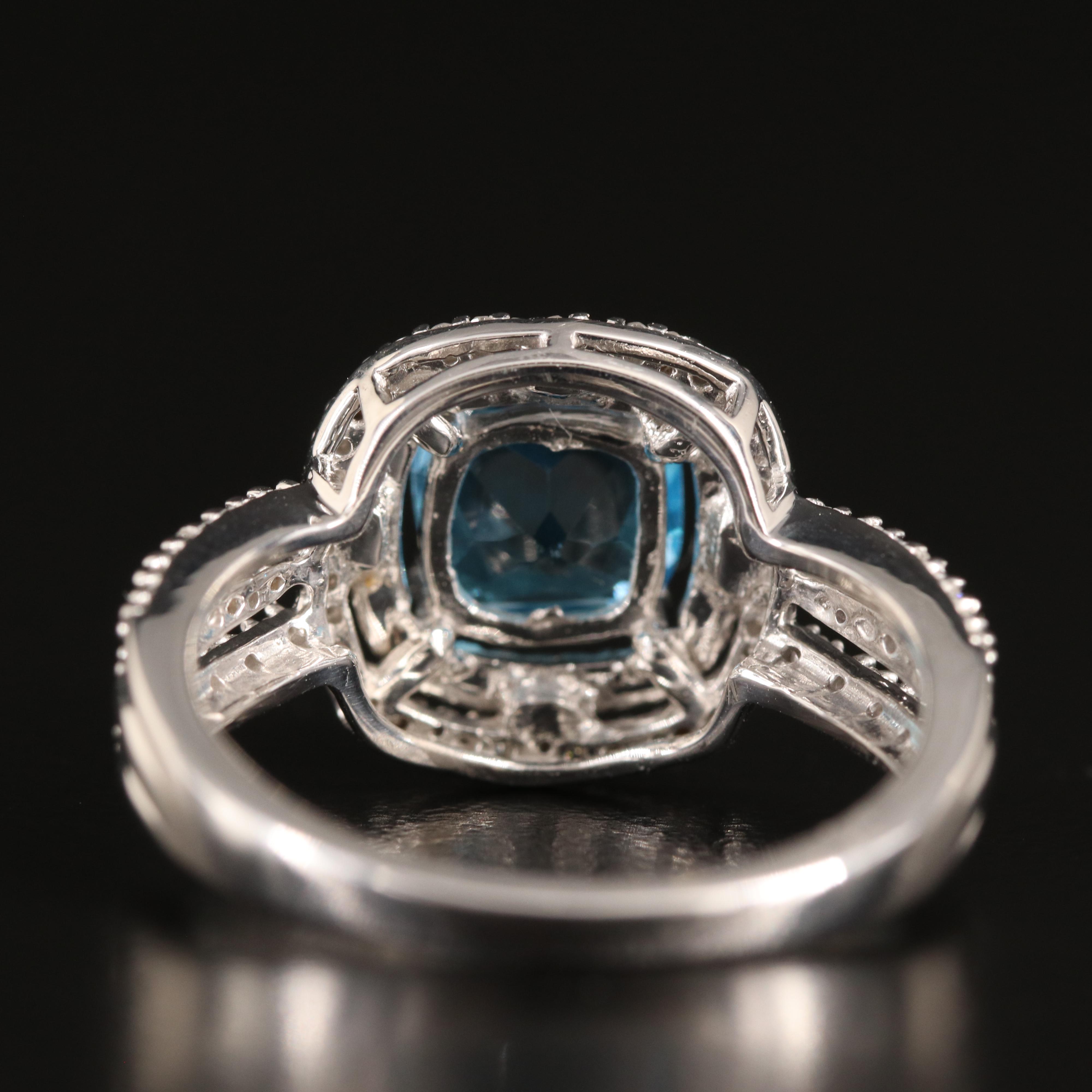 Sterling Sky Blue Topaz and Diamond Ring with 10K Rose Gold Accent