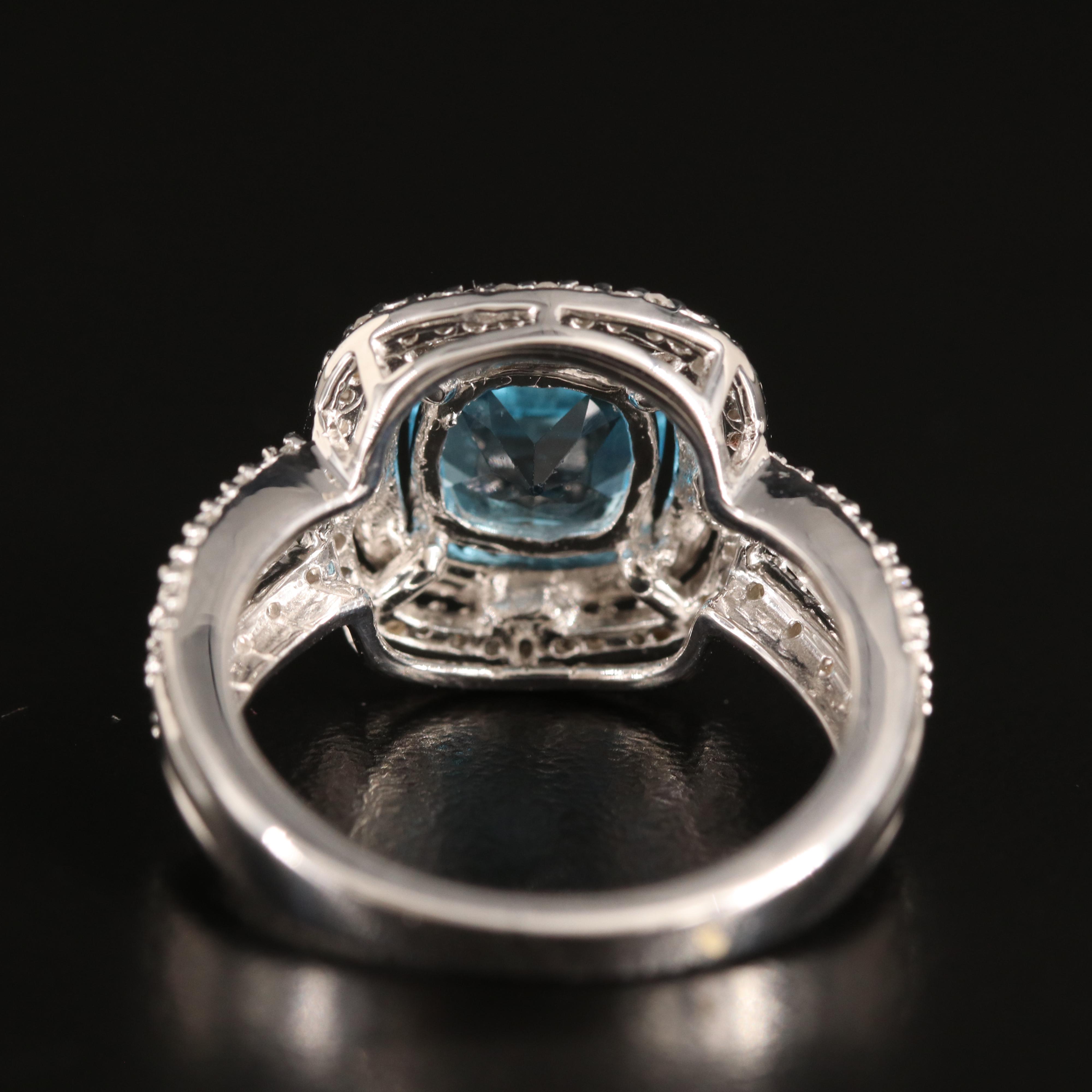 Sterling Sky Blue Topaz and Diamond Ring with 10K Rose Gold Accent