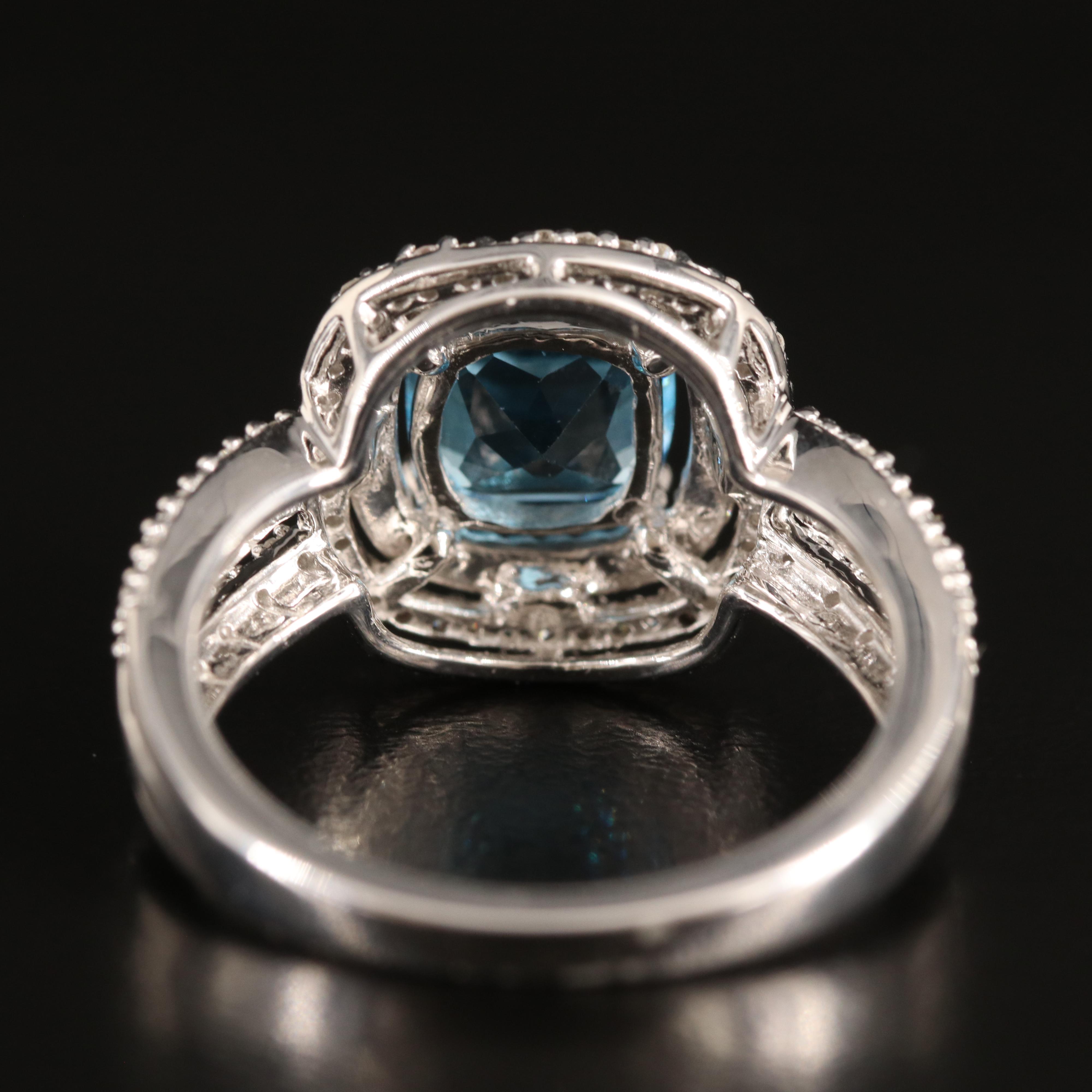 Sterling Sky Blue Topaz and Diamond Ring with 10K Rose Gold Accent