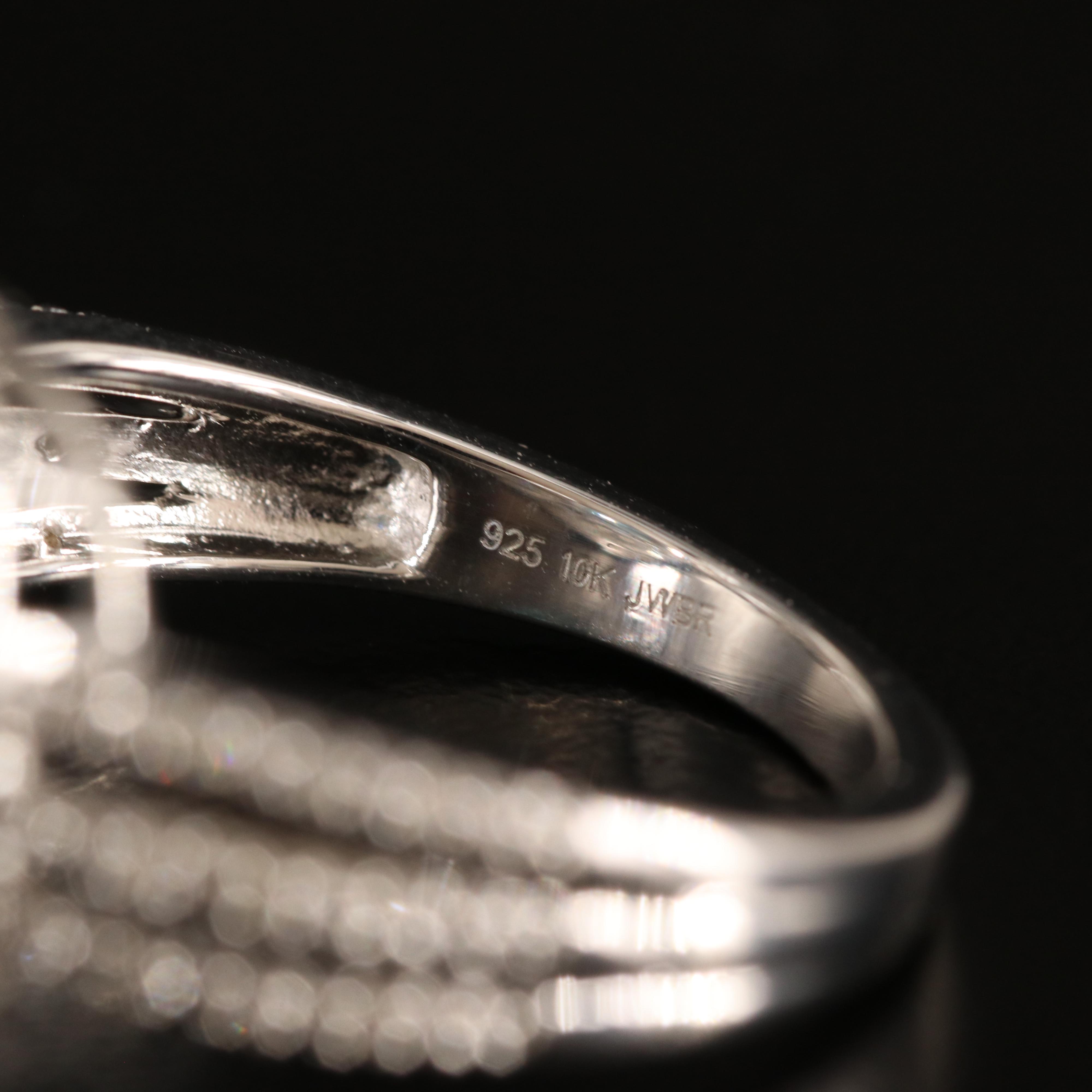 Sterling Sky Blue Topaz and Diamond Ring with 10K Rose Gold Accent