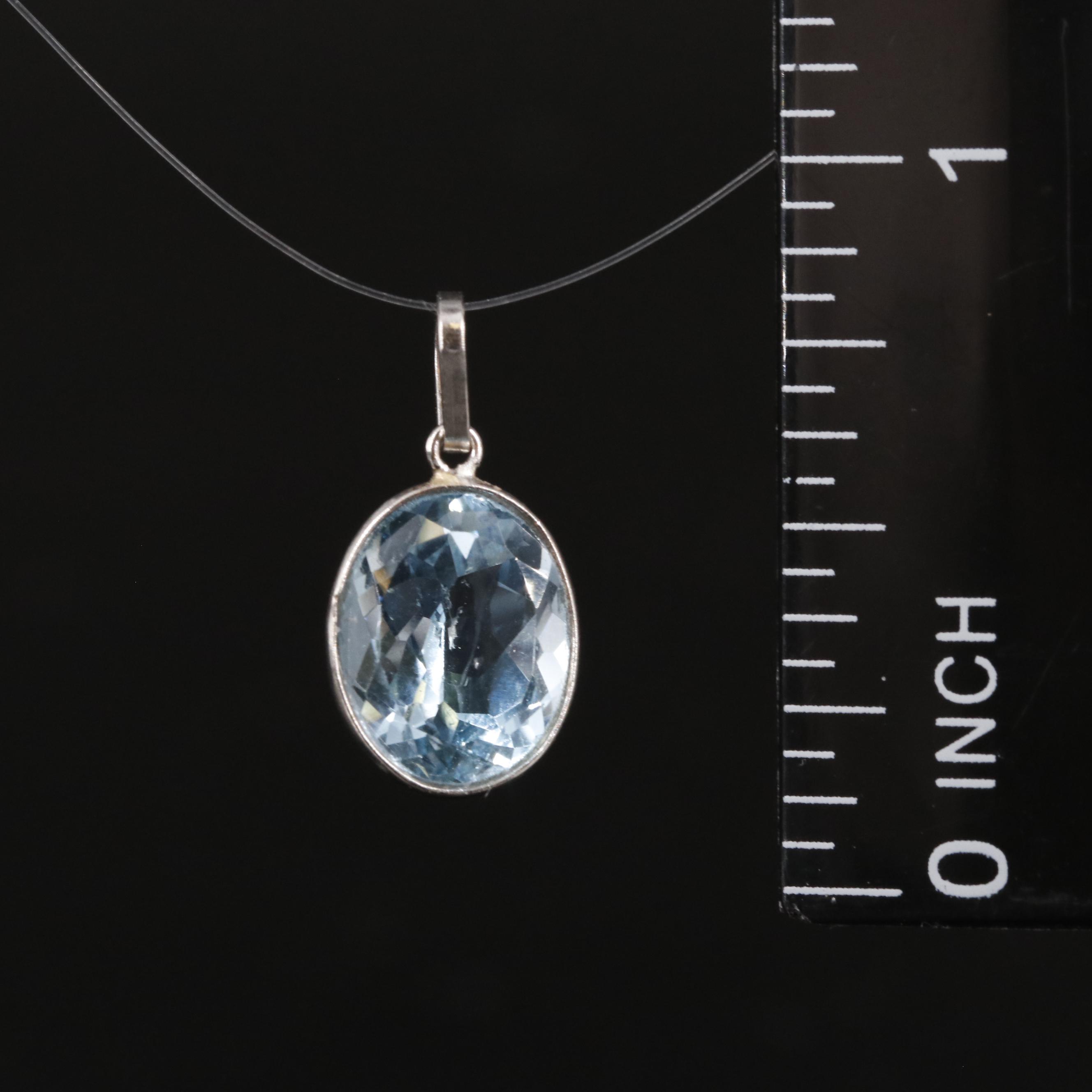14K Blue Topaz Pendant