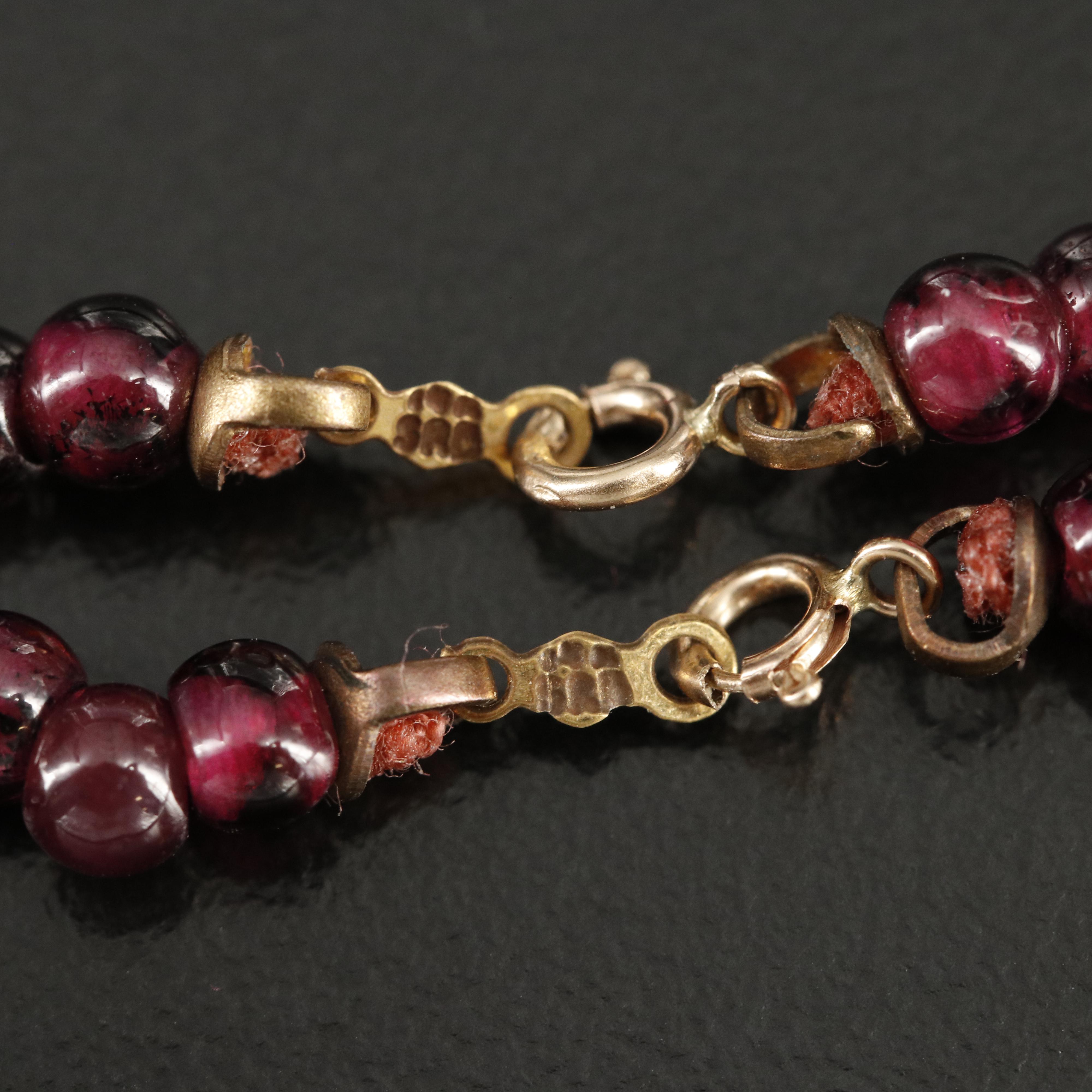 Garnet Necklaces Including 14K and Sterling Silver