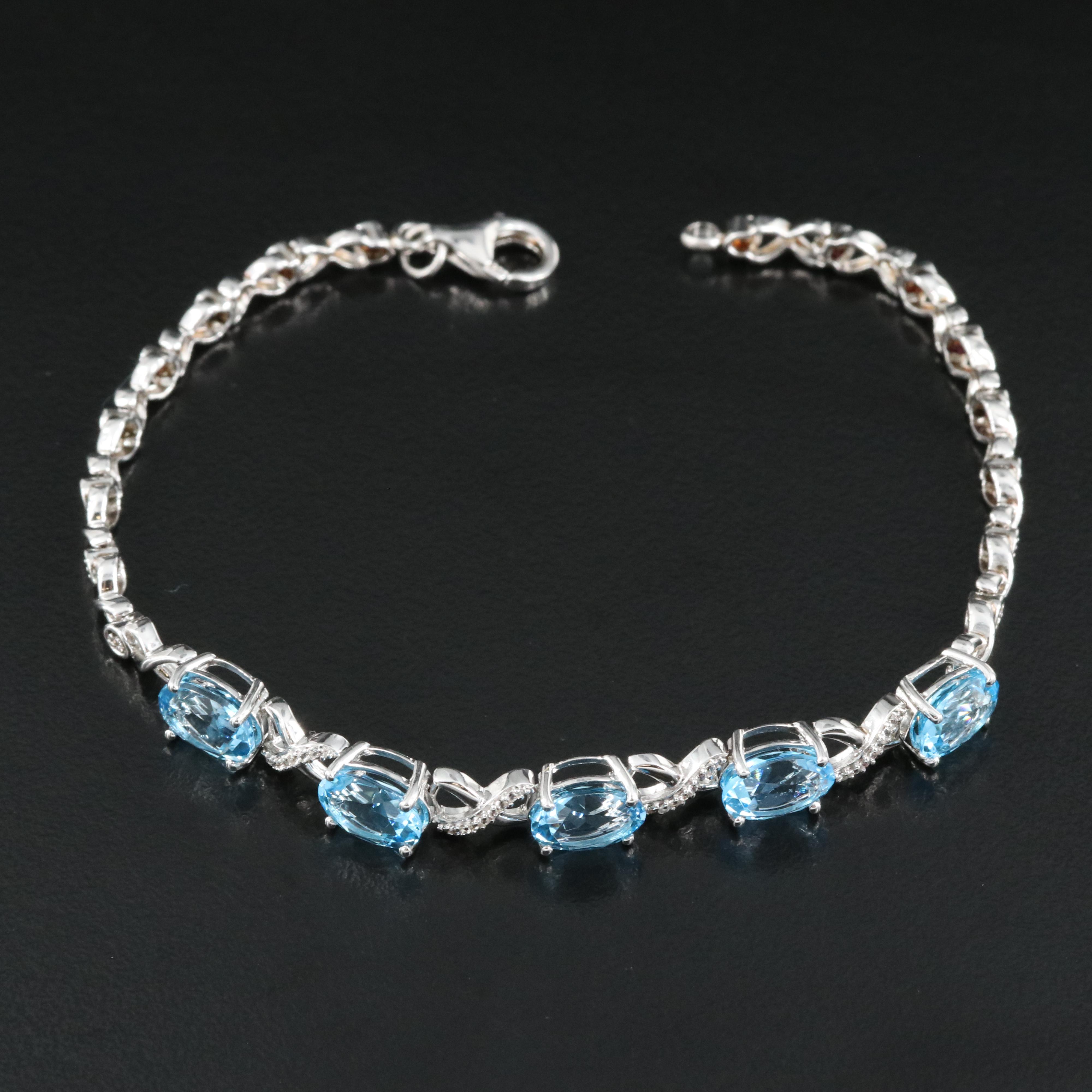 Sterling Swiss Blue Topaz and White Sapphire "X and O" Bracelet