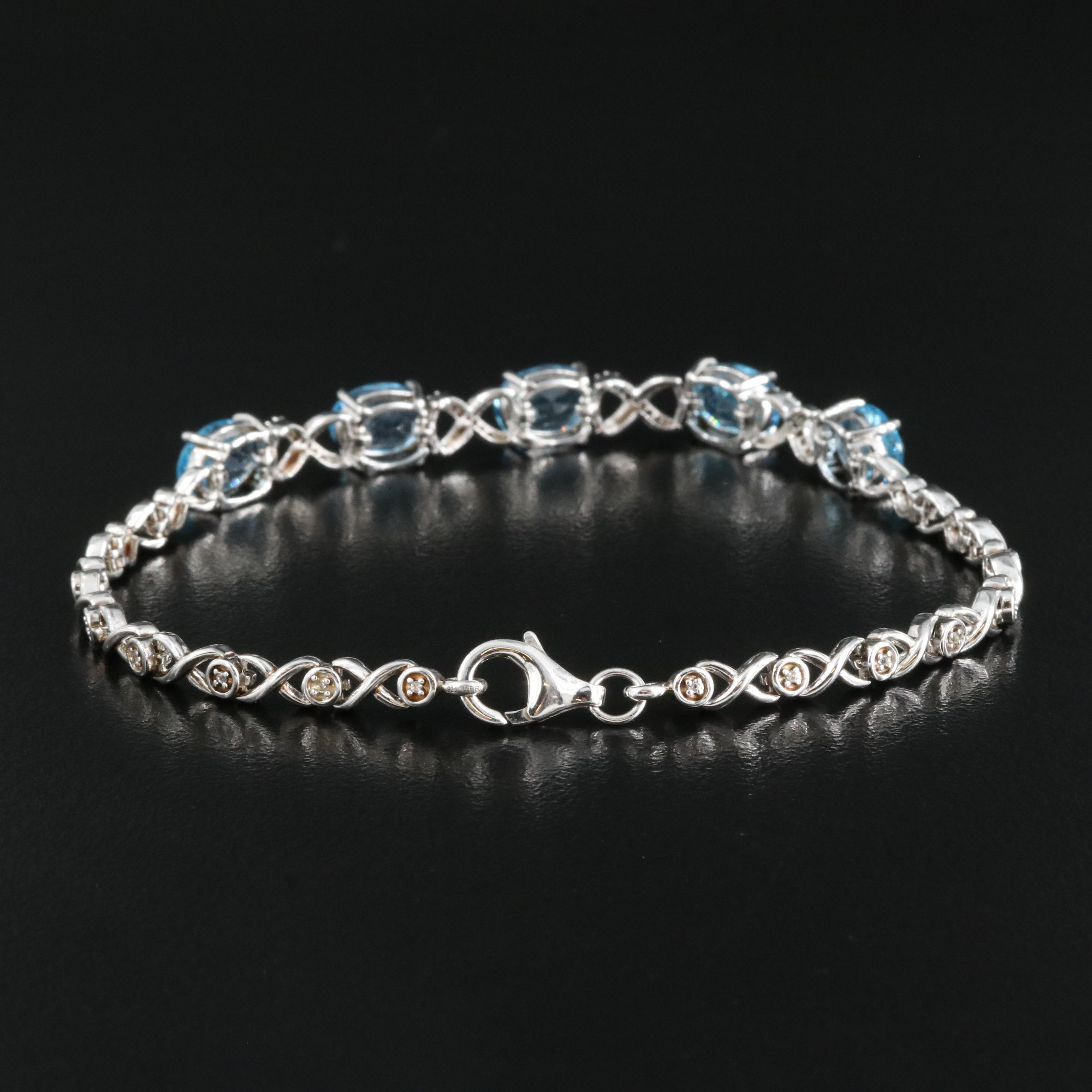 Sterling Swiss Blue Topaz and White Sapphire "X and O" Bracelet