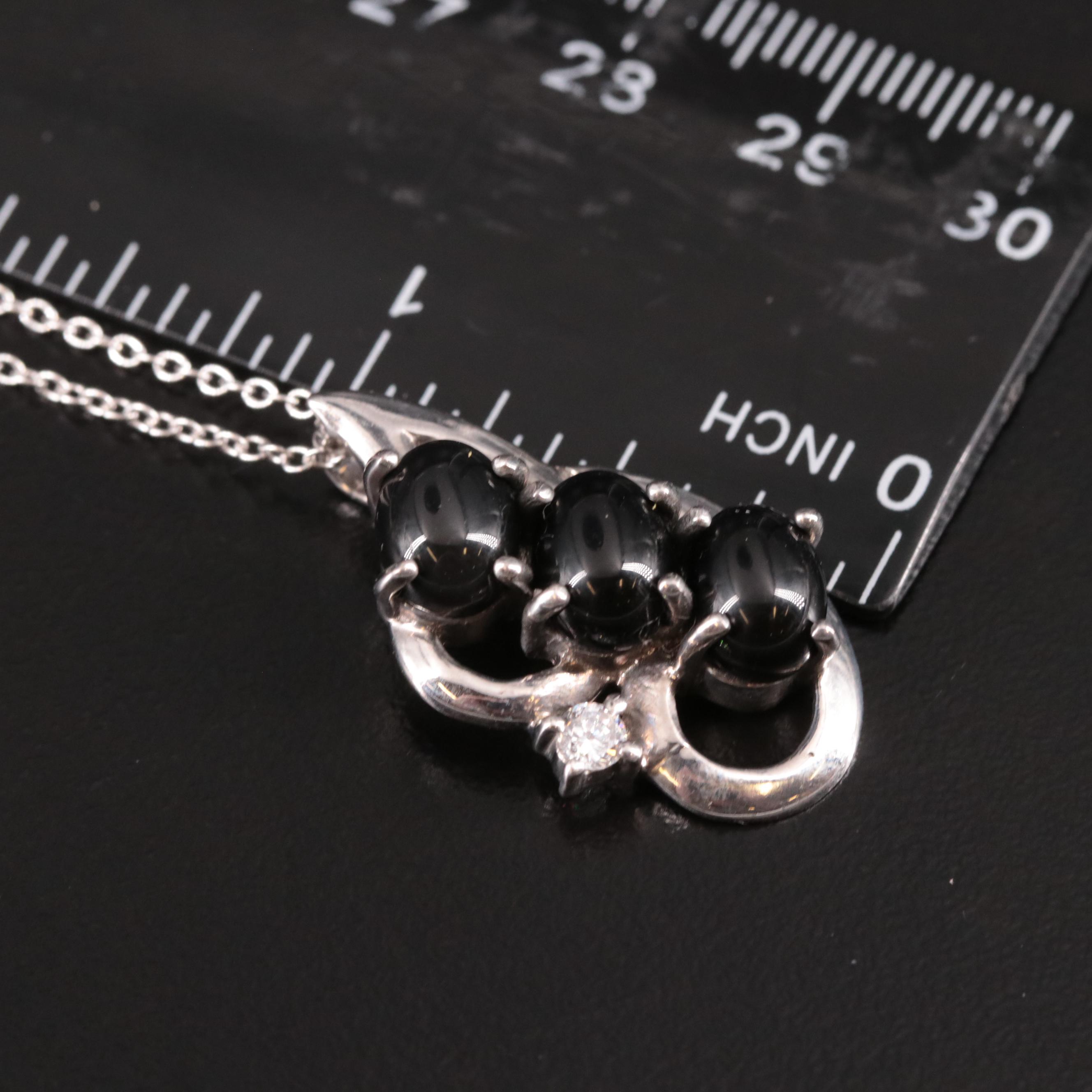 Sterling Silver Black Onyx and Cubic Zirconia Pendant Necklace