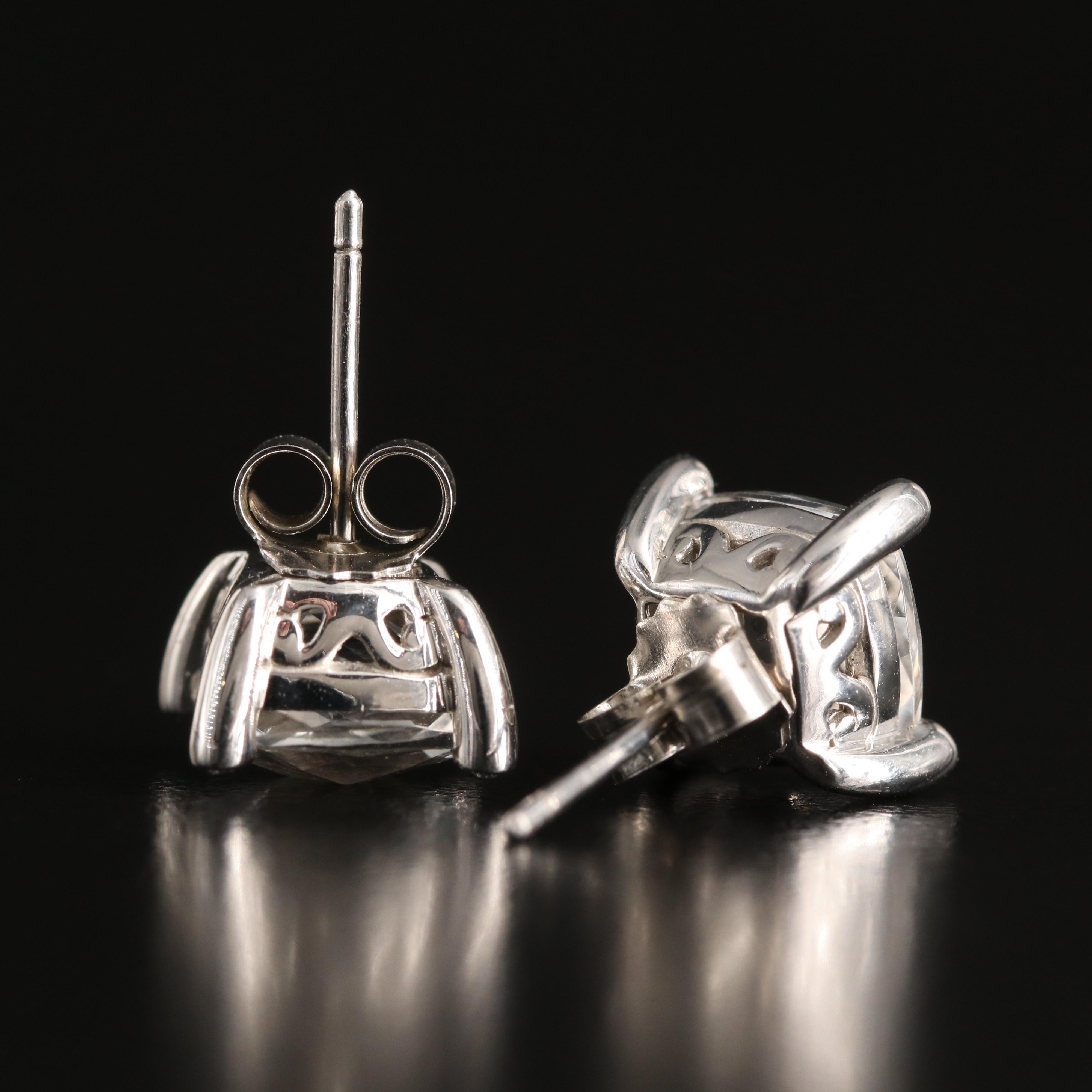 Sterling White Sapphire and Diamond Stud Earrings