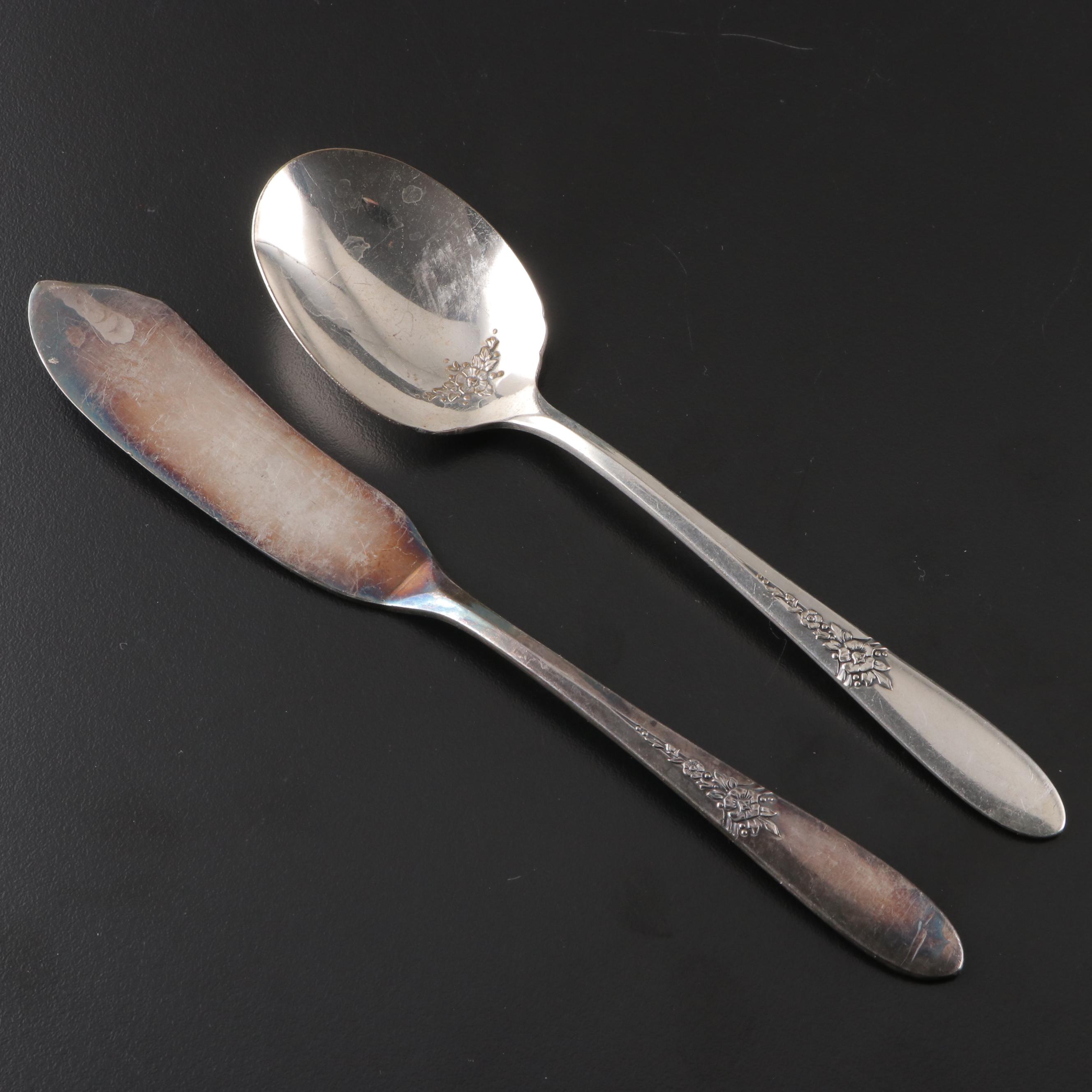 Oneida Silver Plate Flatware Service with Rose Ornamented Handles