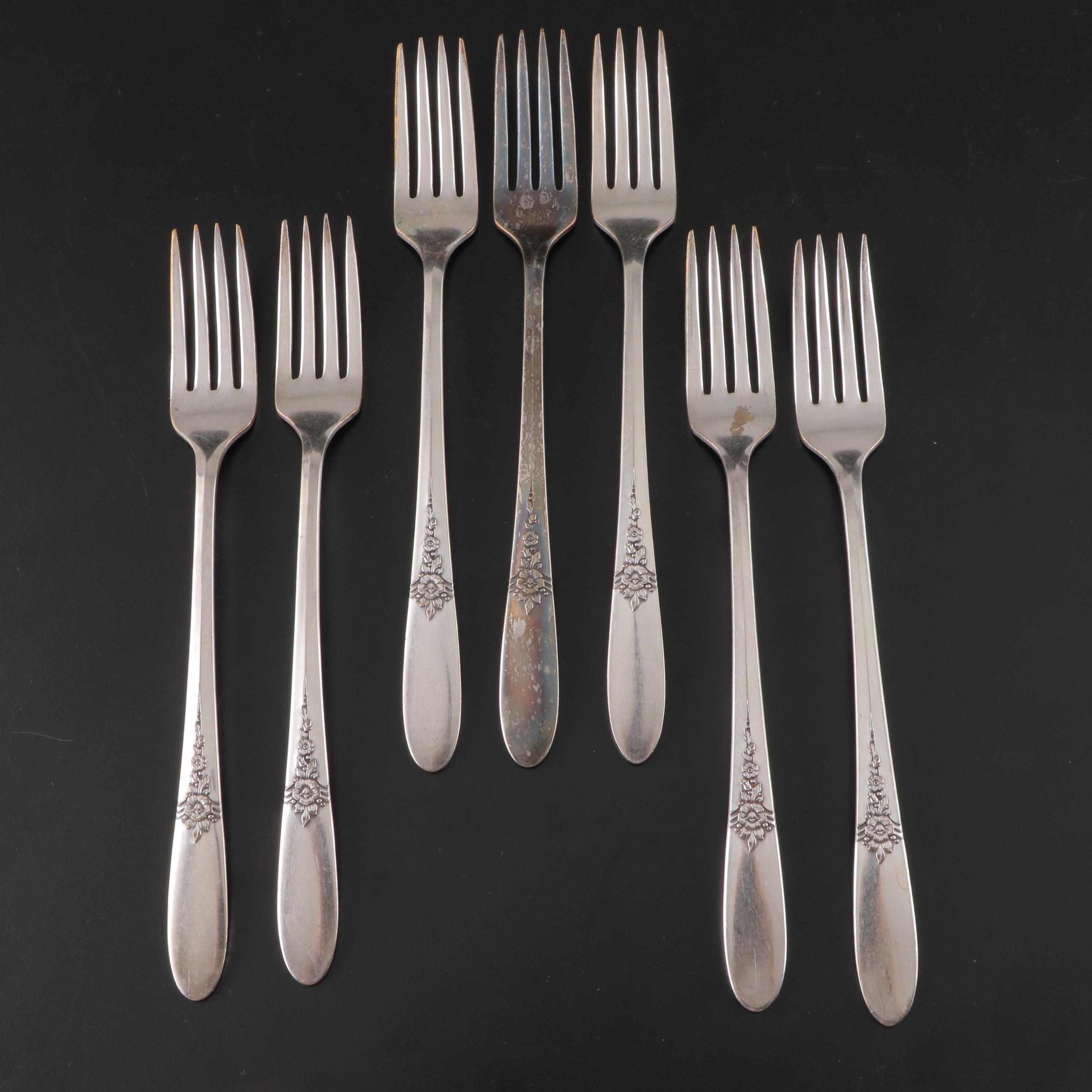Oneida Silver Plate Flatware Service with Rose Ornamented Handles