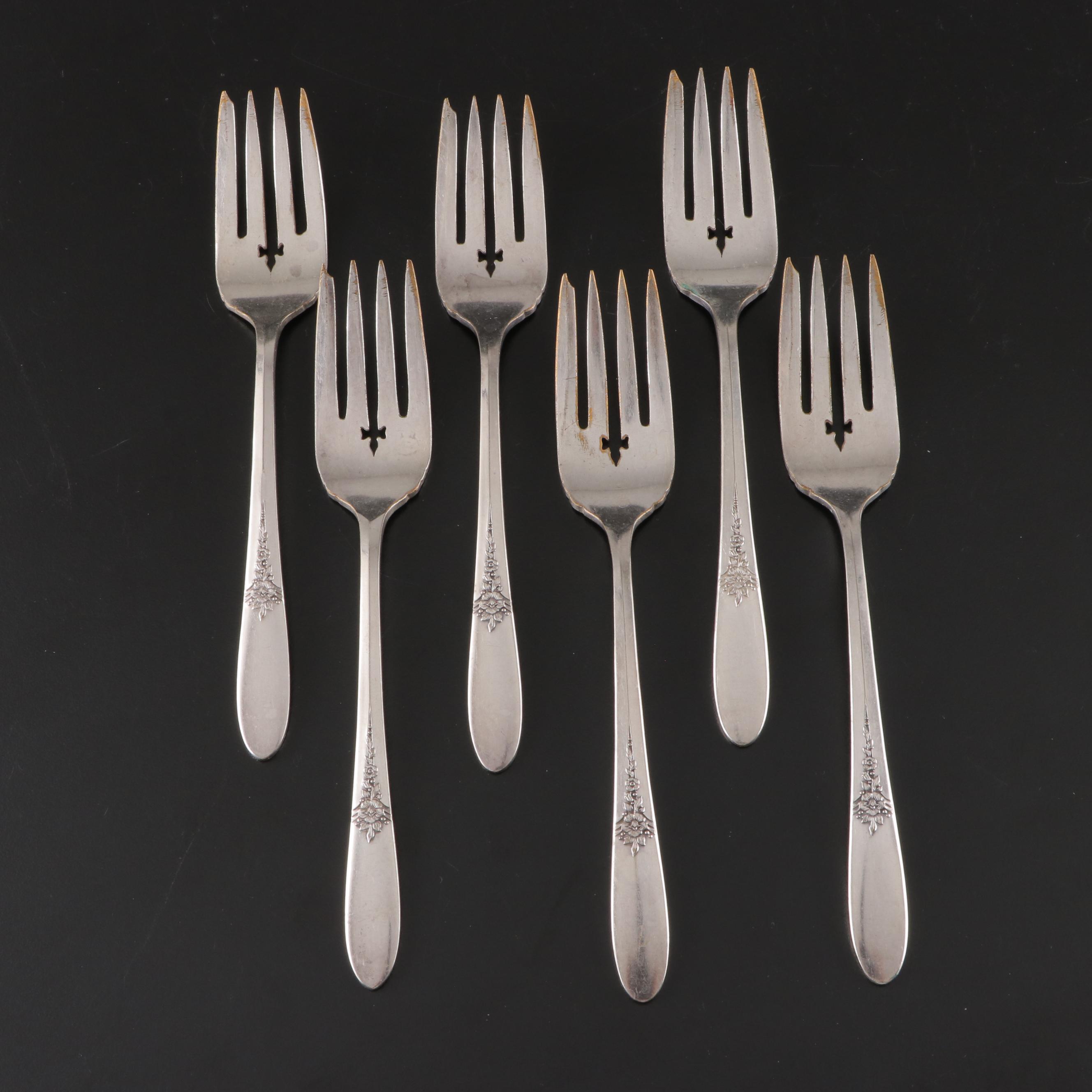 Oneida Silver Plate Flatware Service with Rose Ornamented Handles