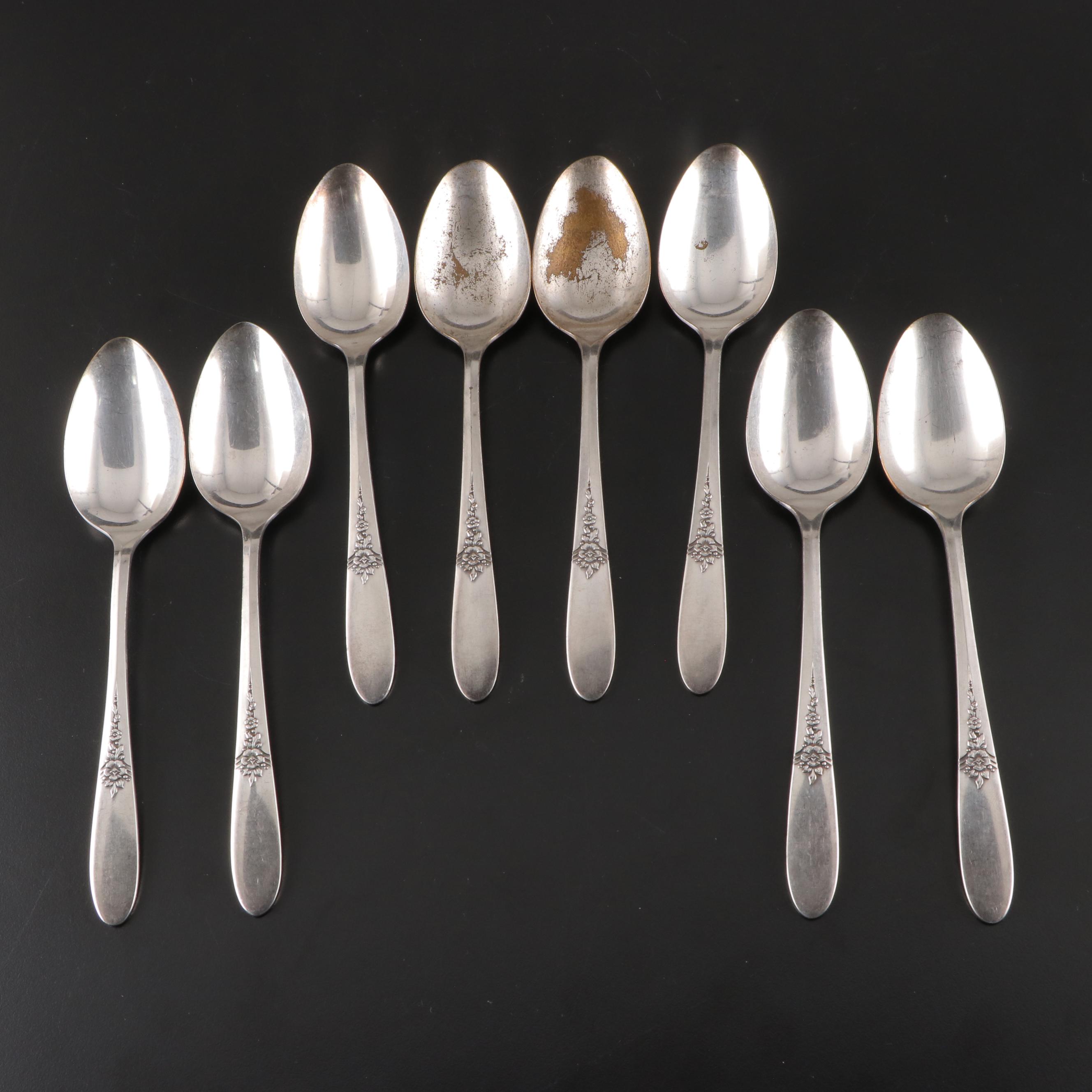 Oneida Silver Plate Flatware Service with Rose Ornamented Handles