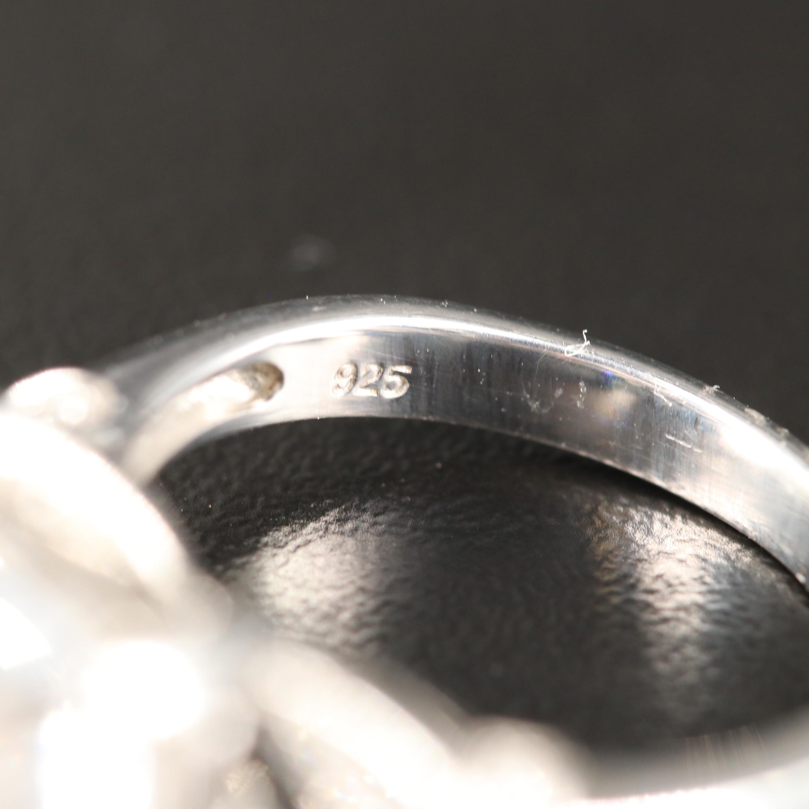 Sterling Topaz Ring with Diamond Accented Shoulders