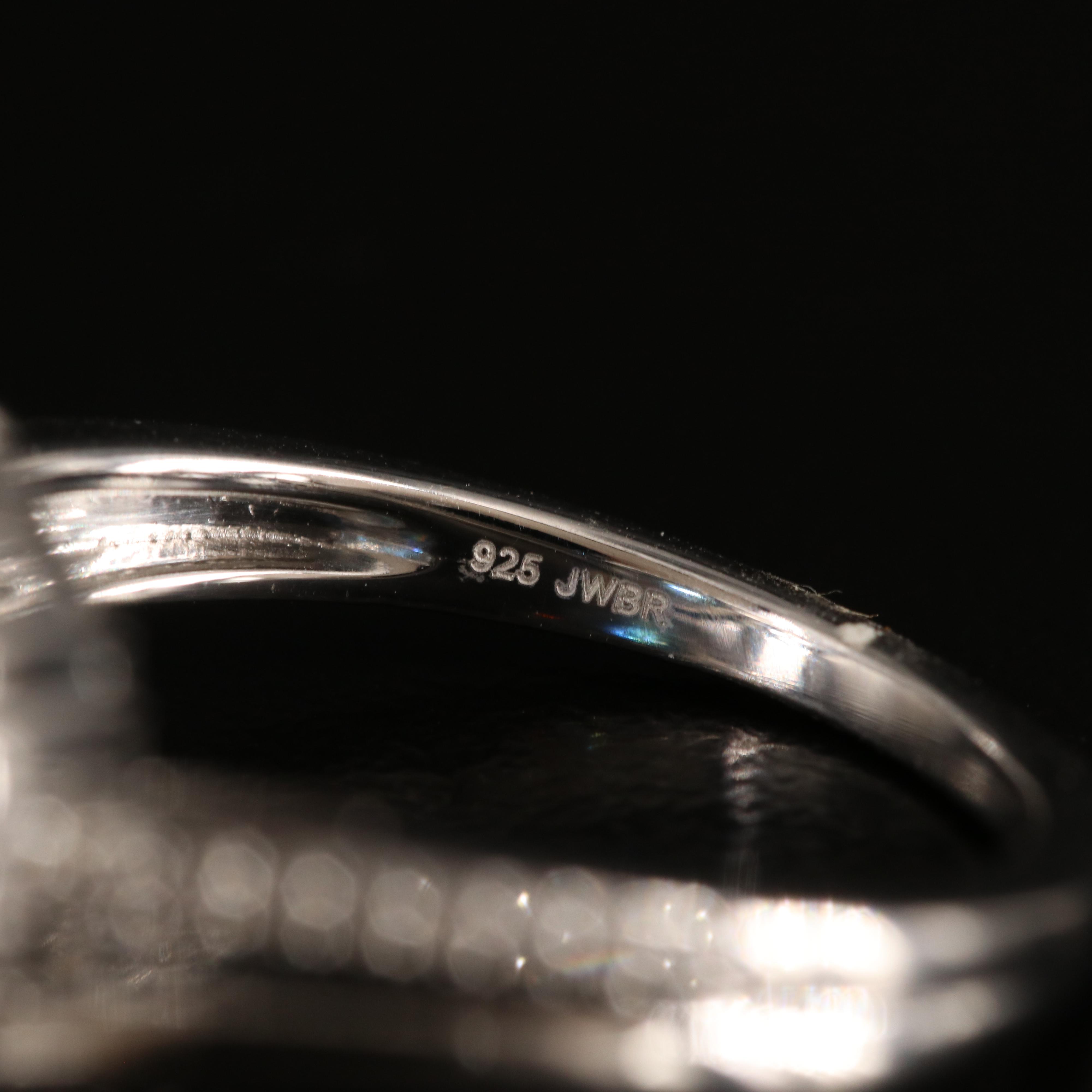 Sterling Sky Blue Topaz and White Sapphire Ring