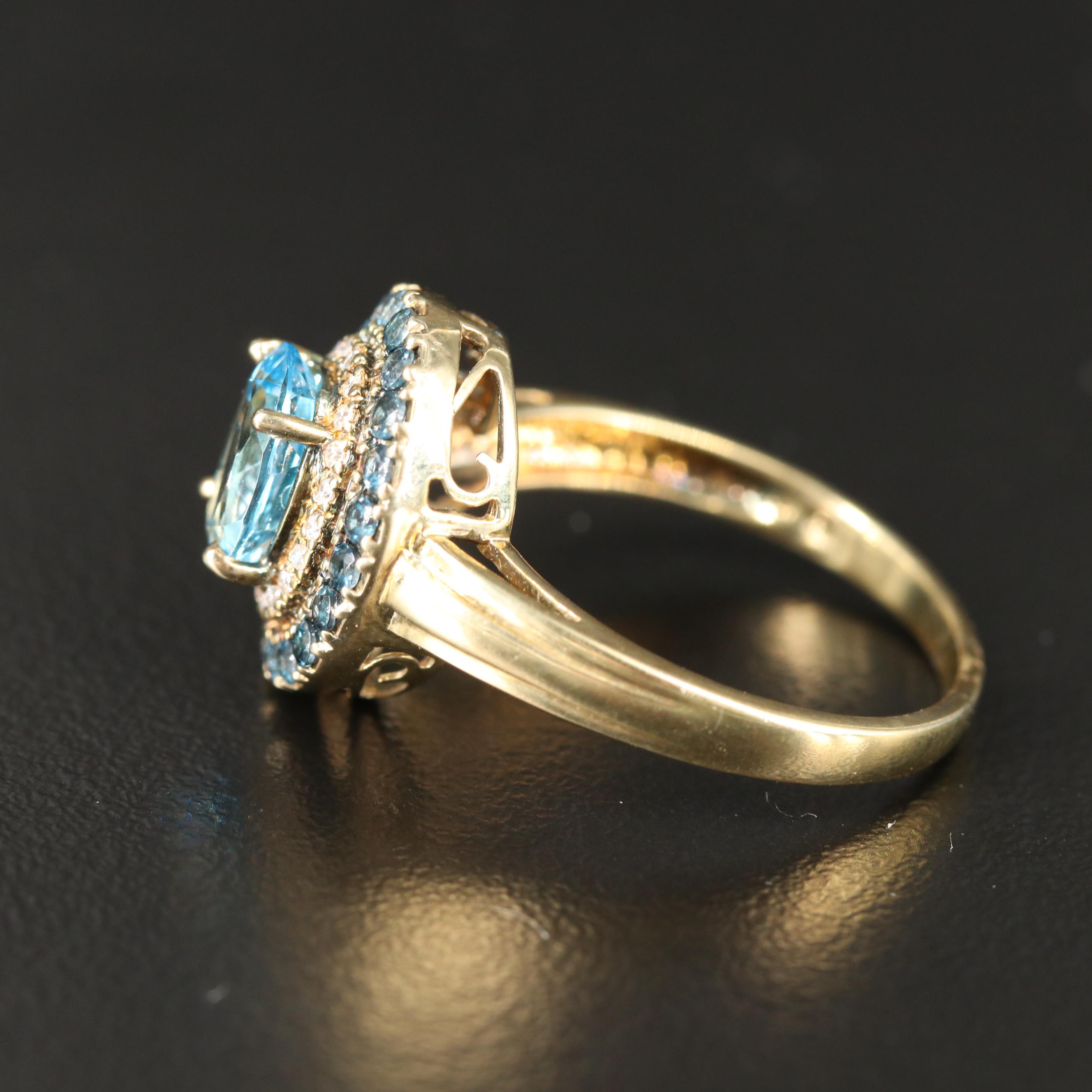 Sterling Swiss Blue Topaz Ring with Diamond Halo