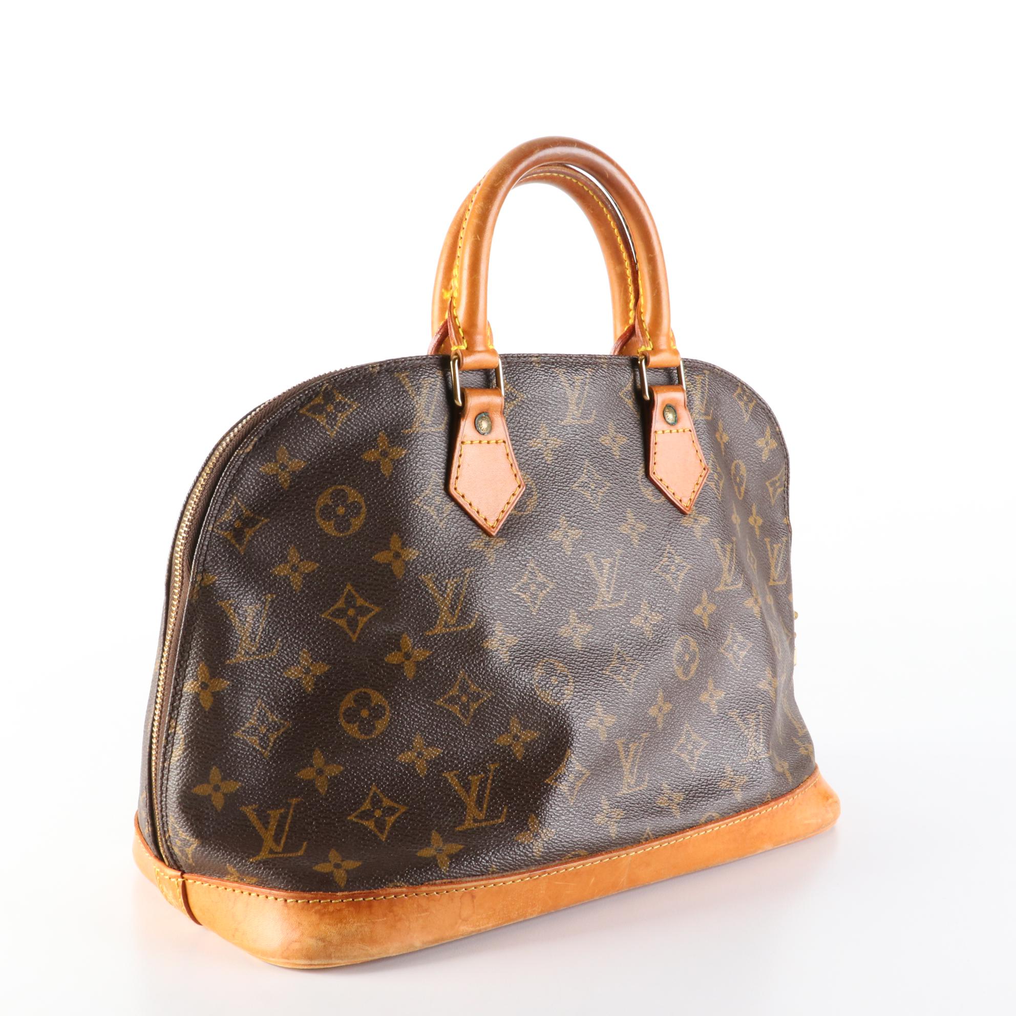 Louis Vuitton Alma PM Bag in Monogram Canvas and Leather