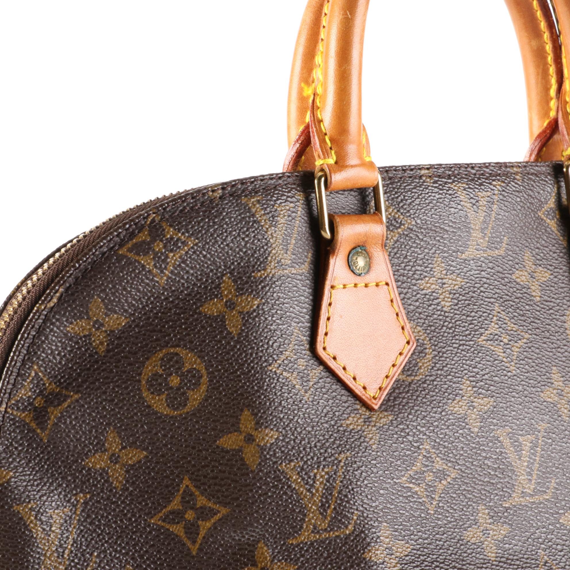Louis Vuitton Alma PM Bag in Monogram Canvas and Leather
