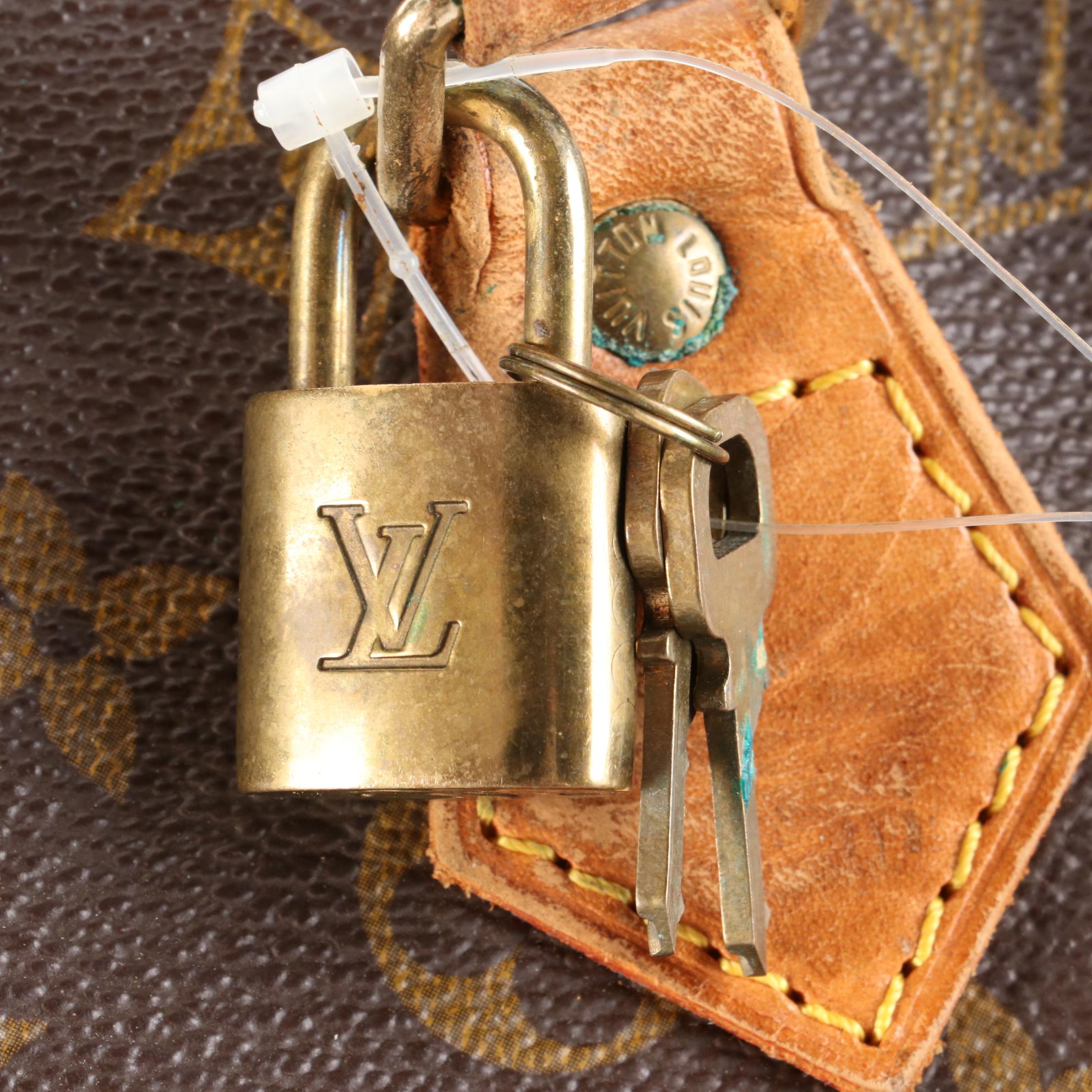Louis Vuitton Alma PM Bag in Monogram Canvas and Leather