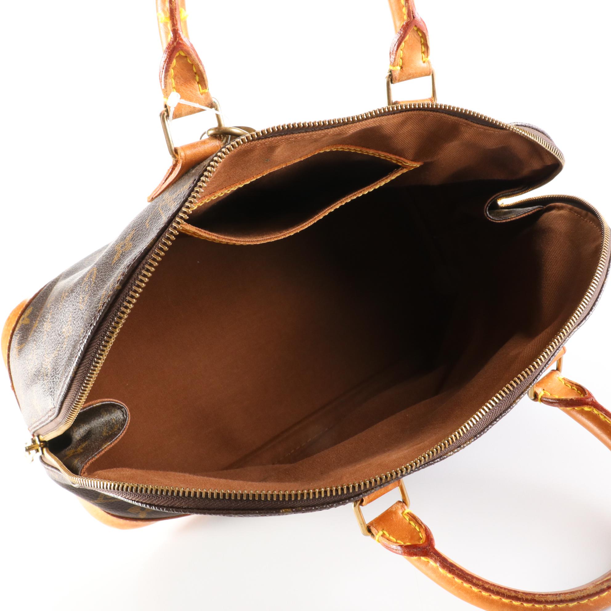 Louis Vuitton Alma PM Bag in Monogram Canvas and Leather