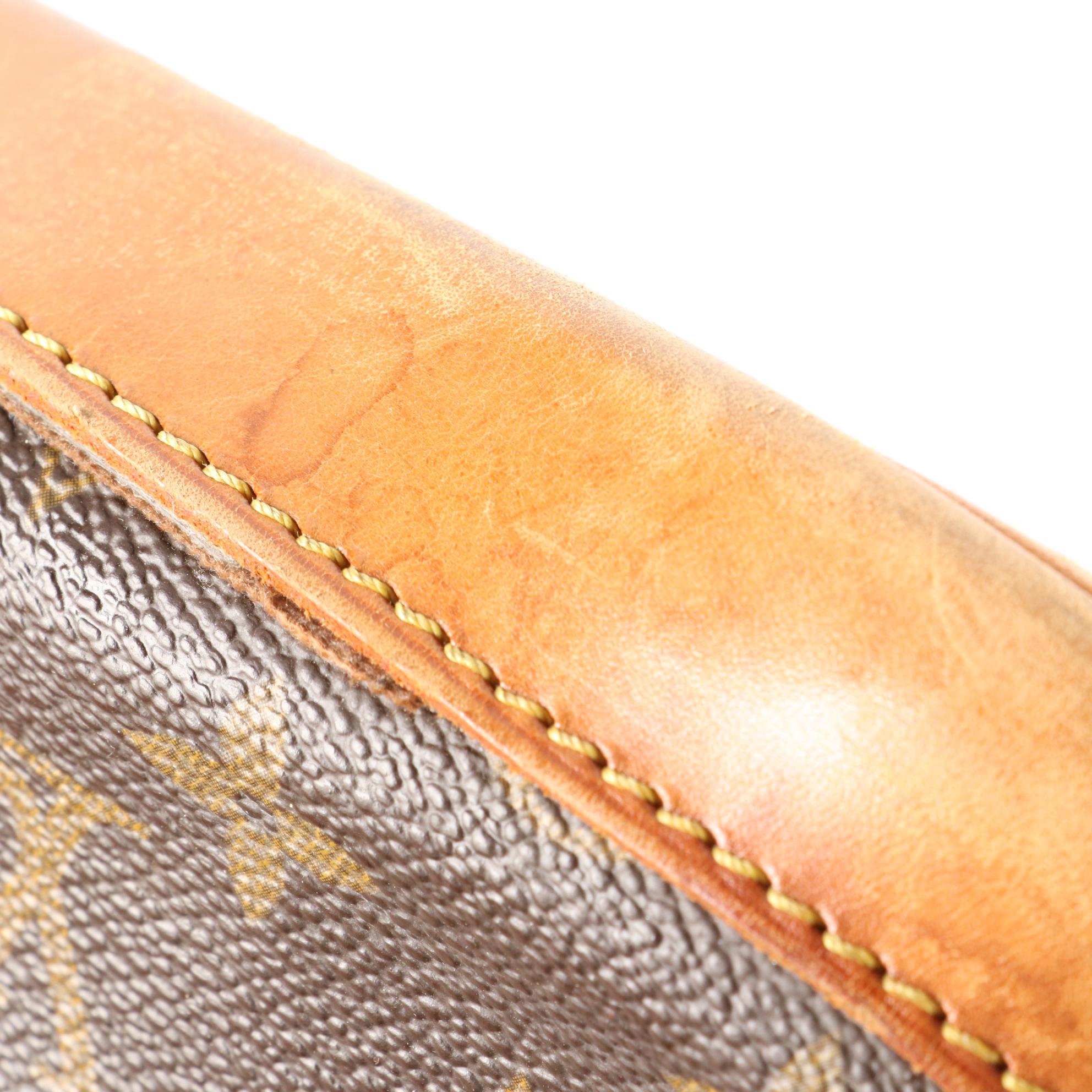 Louis Vuitton Alma PM Bag in Monogram Canvas and Leather