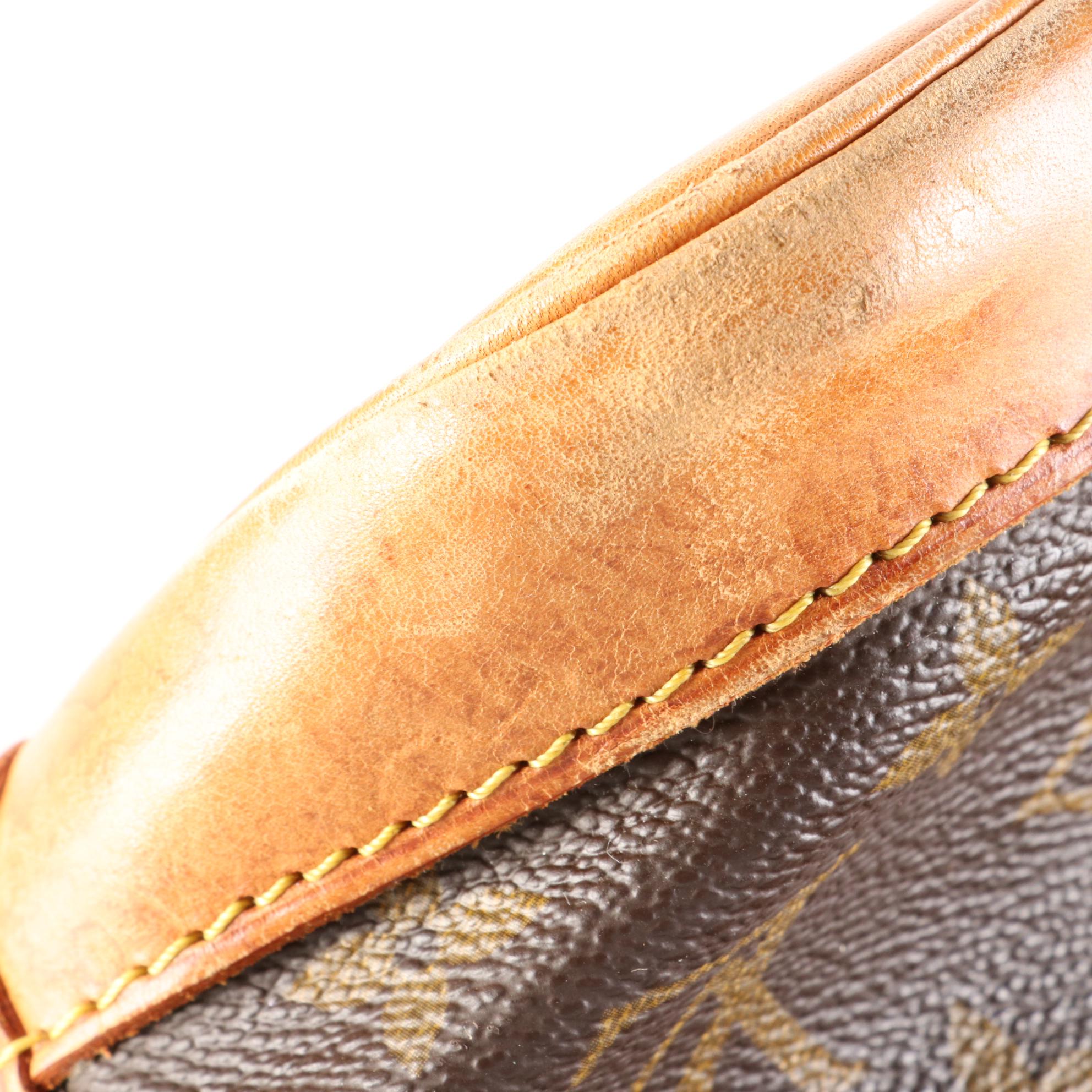 Louis Vuitton Alma PM Bag in Monogram Canvas and Leather