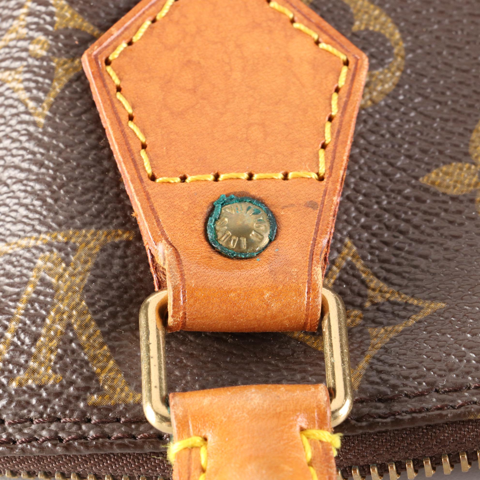 Louis Vuitton Alma PM Bag in Monogram Canvas and Leather