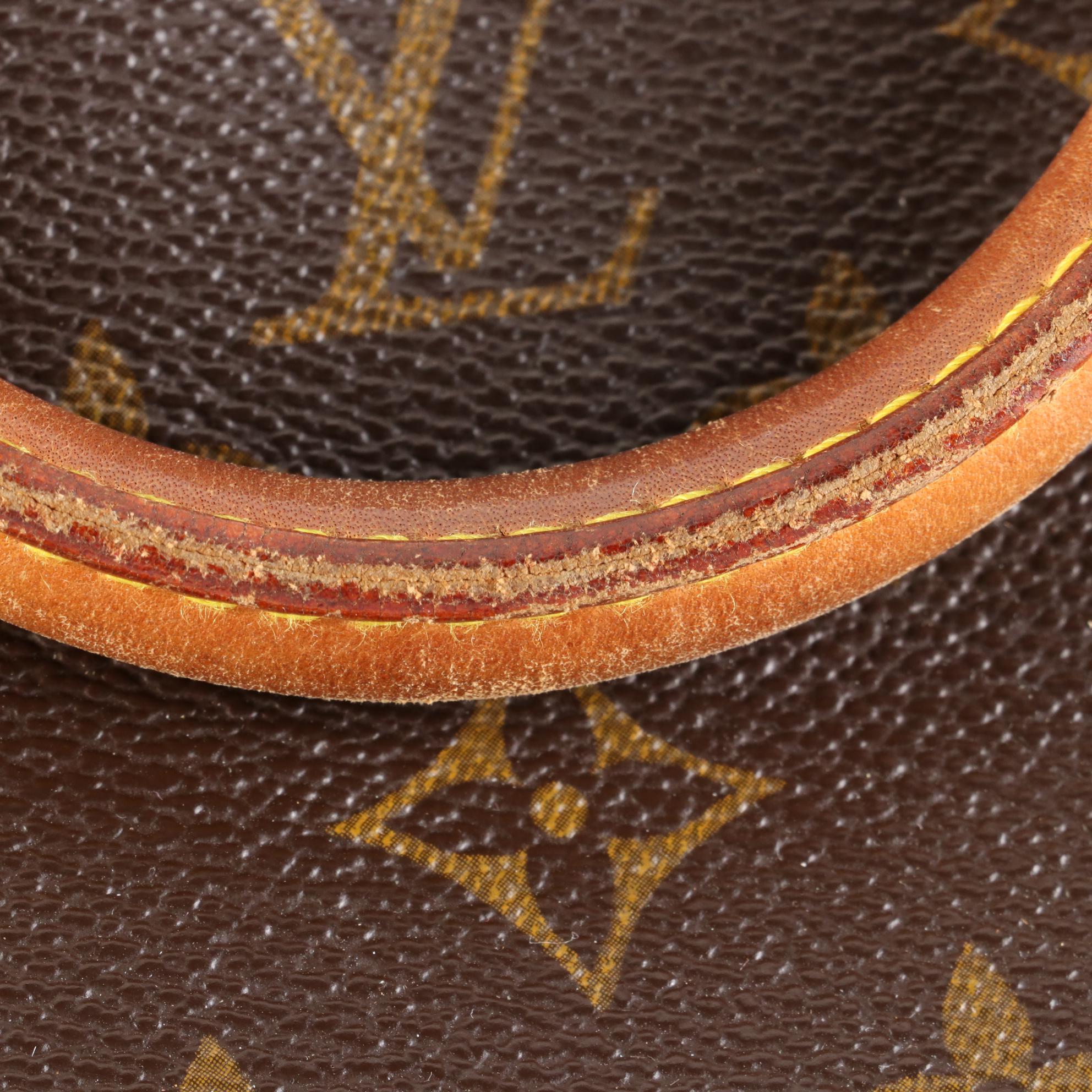 Louis Vuitton Alma PM Bag in Monogram Canvas and Leather