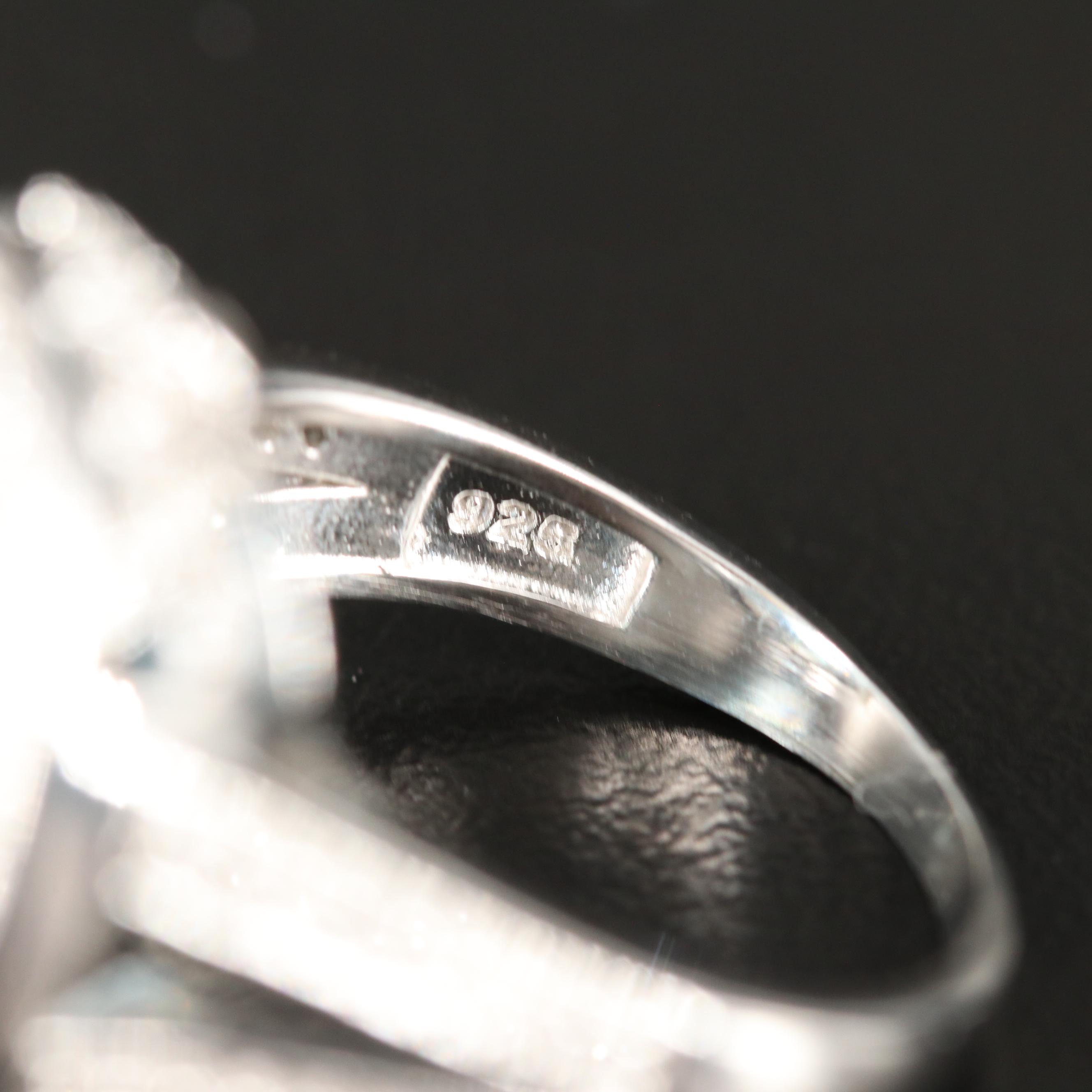 Swiss Blue Topaz Ring with White Sapphire Accents in Sterling