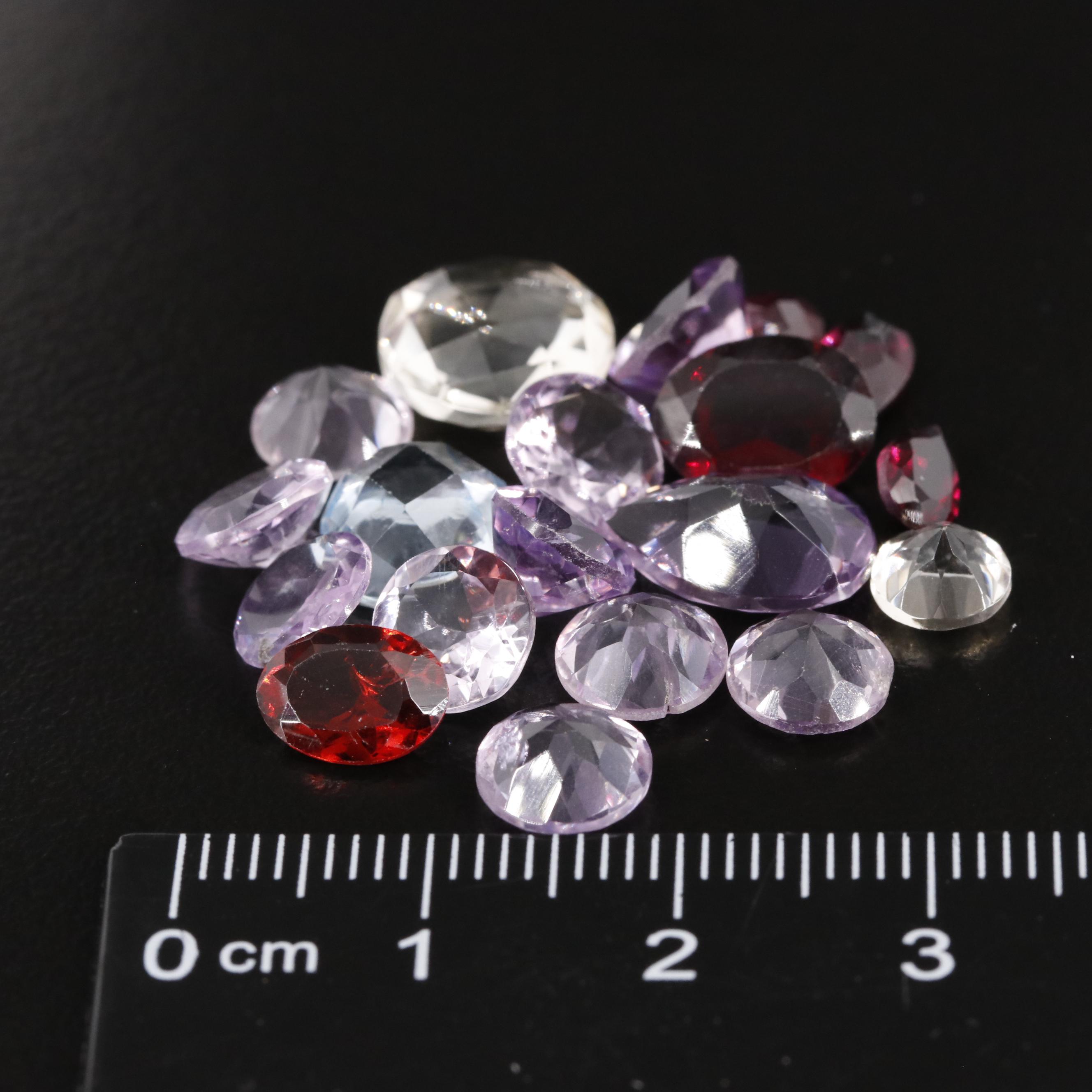Loose 26.41 CTW Amethyst, Citrine and Garnet Lot