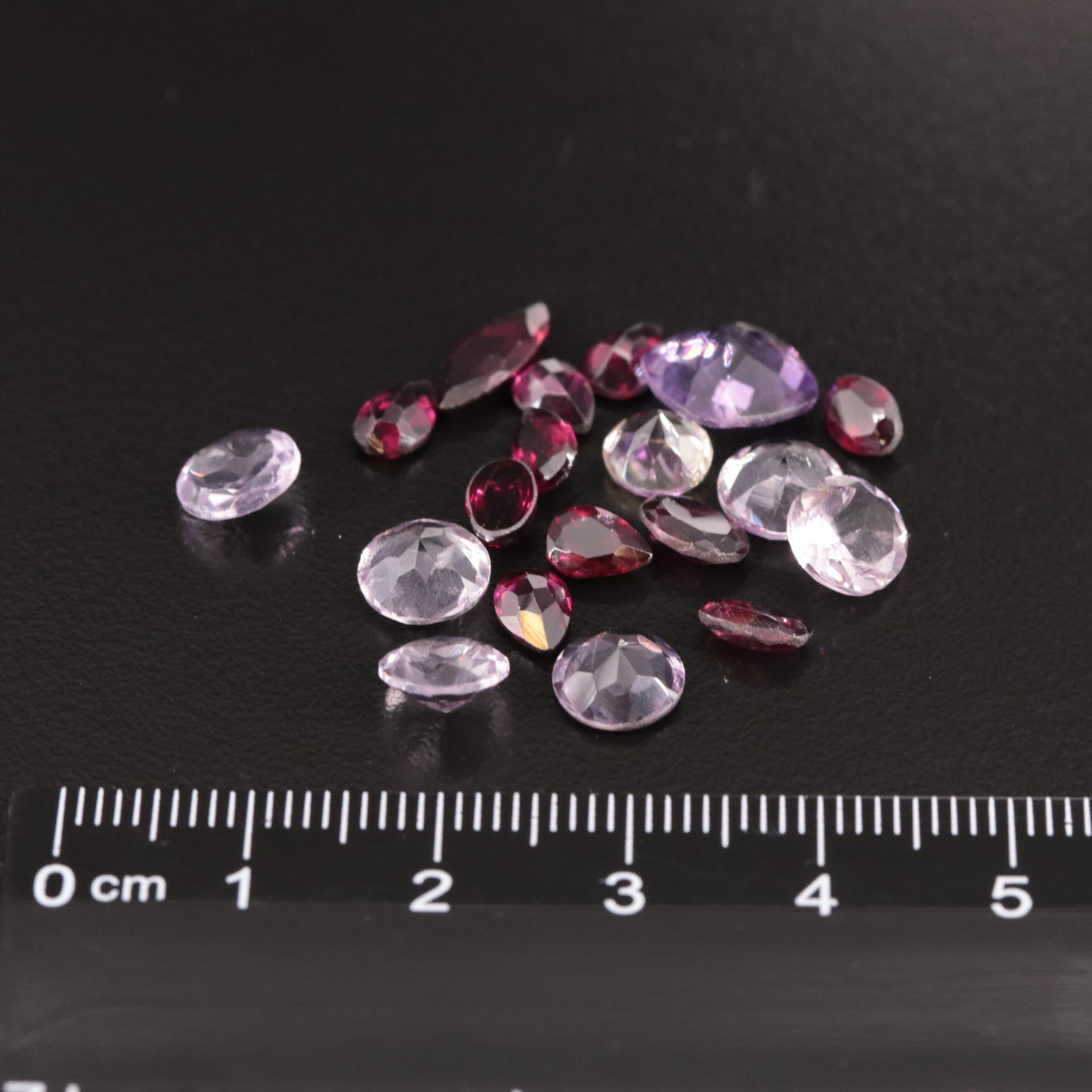 Loose 16.40 CTW Amethyst, Citrine, and Garnet Lot