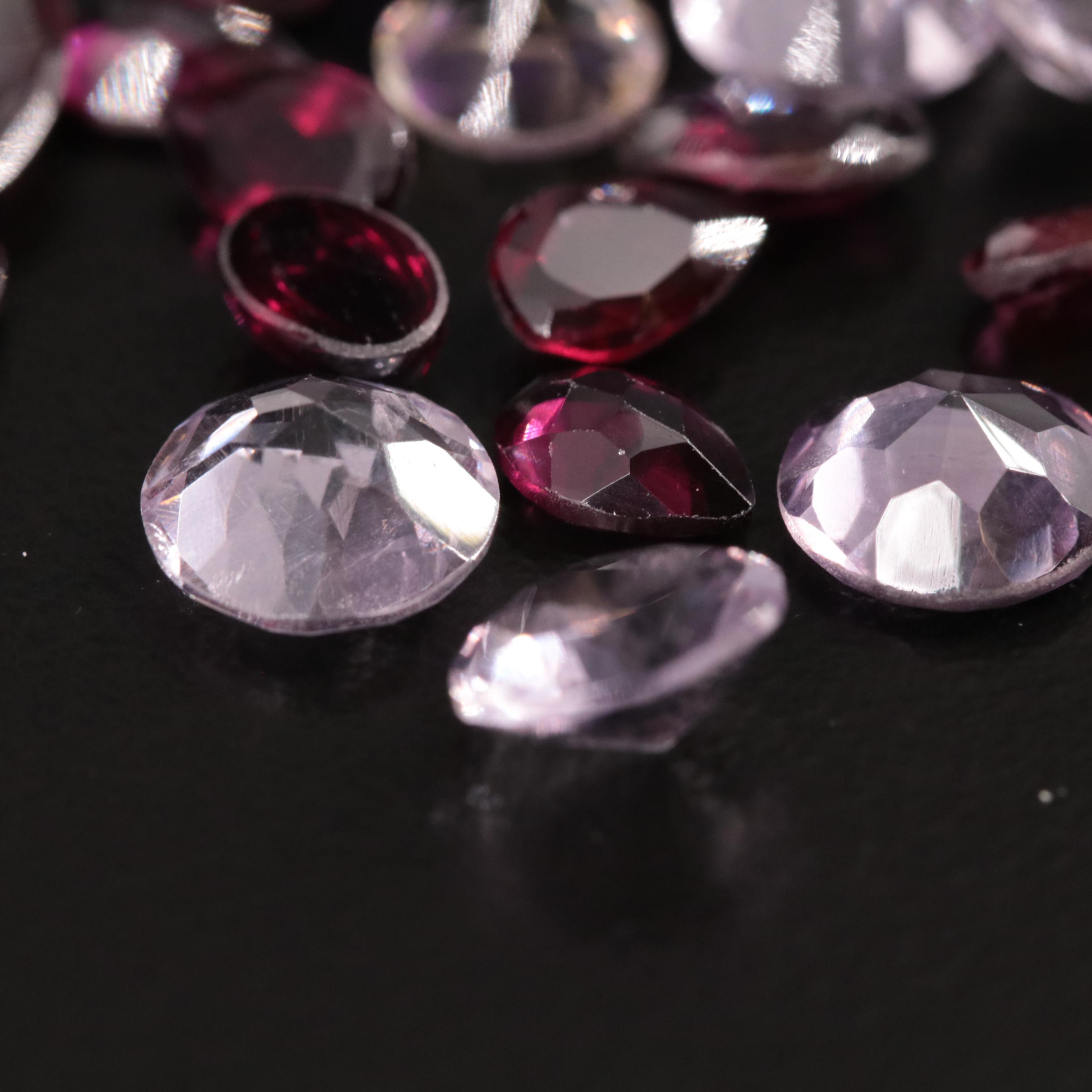 Loose 16.40 CTW Amethyst, Citrine, and Garnet Lot