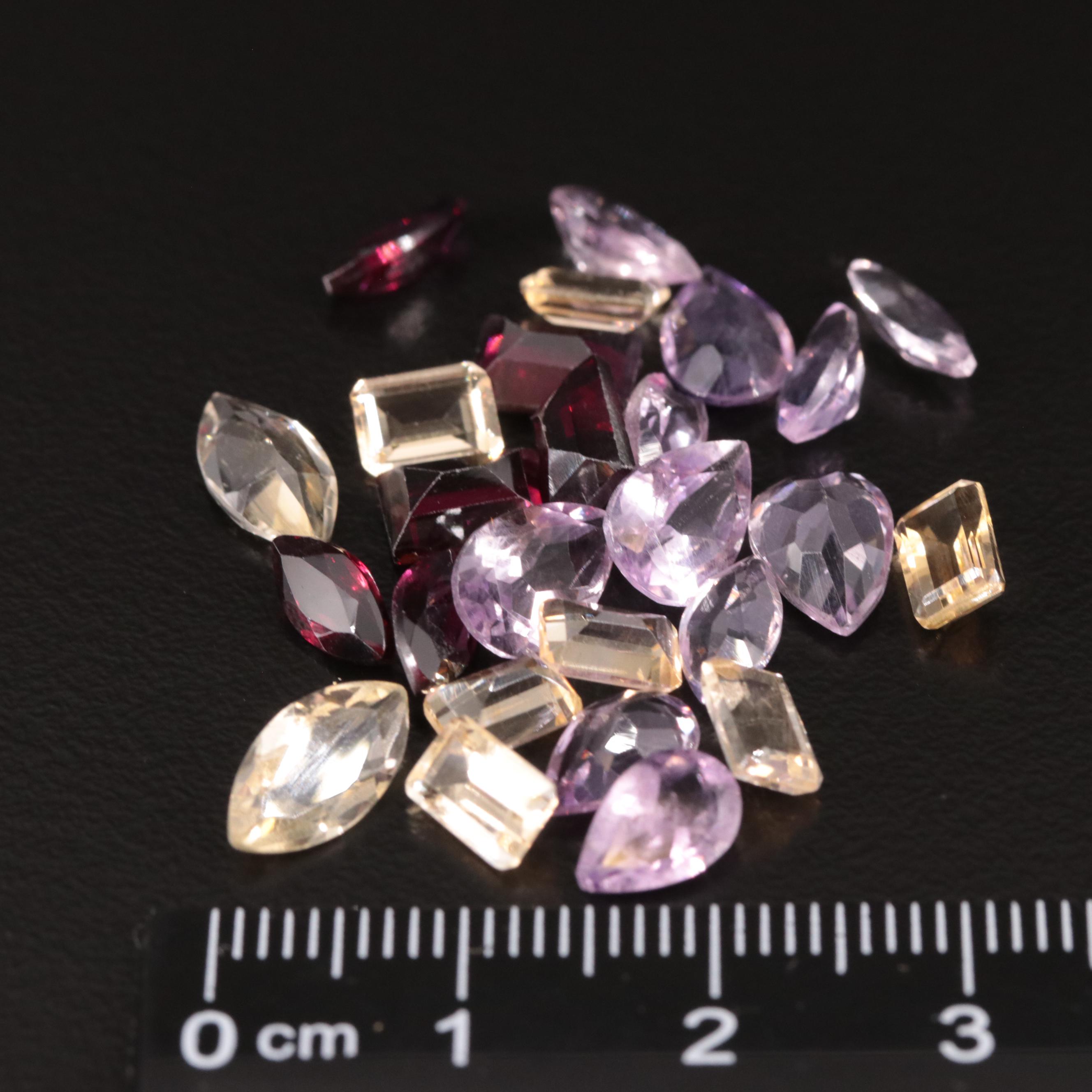 Loose 19.76 CTW Amethyst, Citrine and Garnet Lot