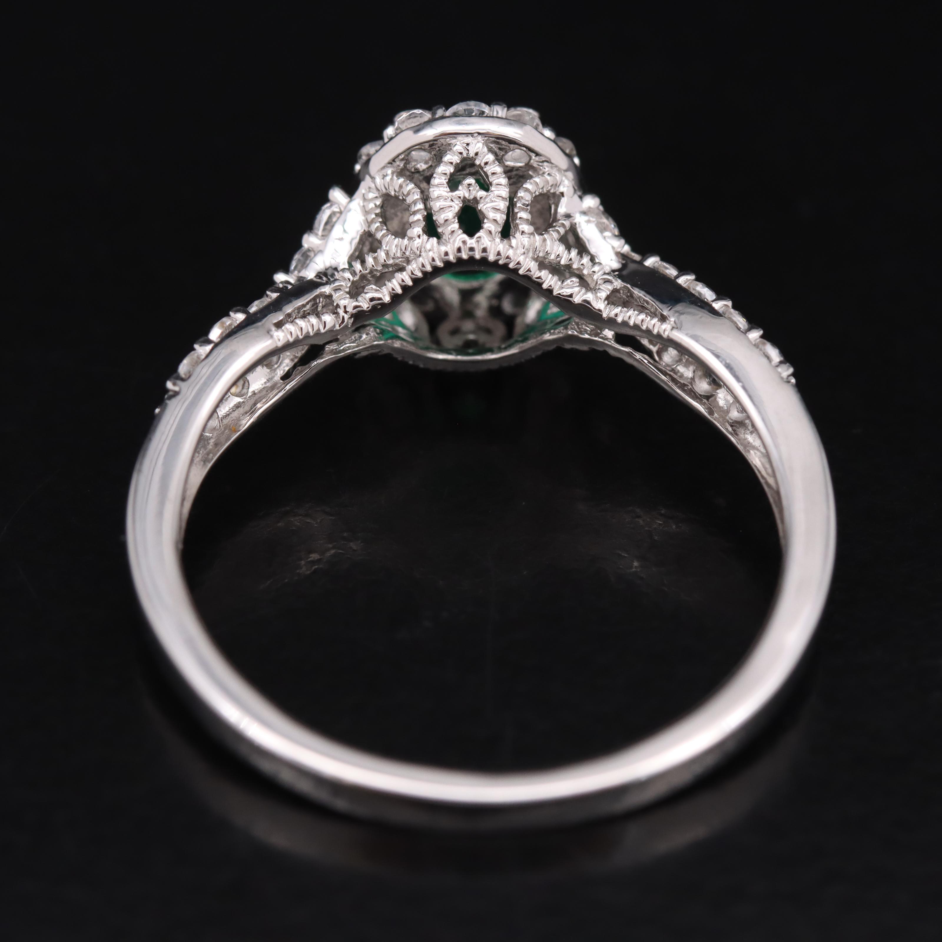 Sterling Emerald and Sapphire Halo Ring with Twist Shoulders