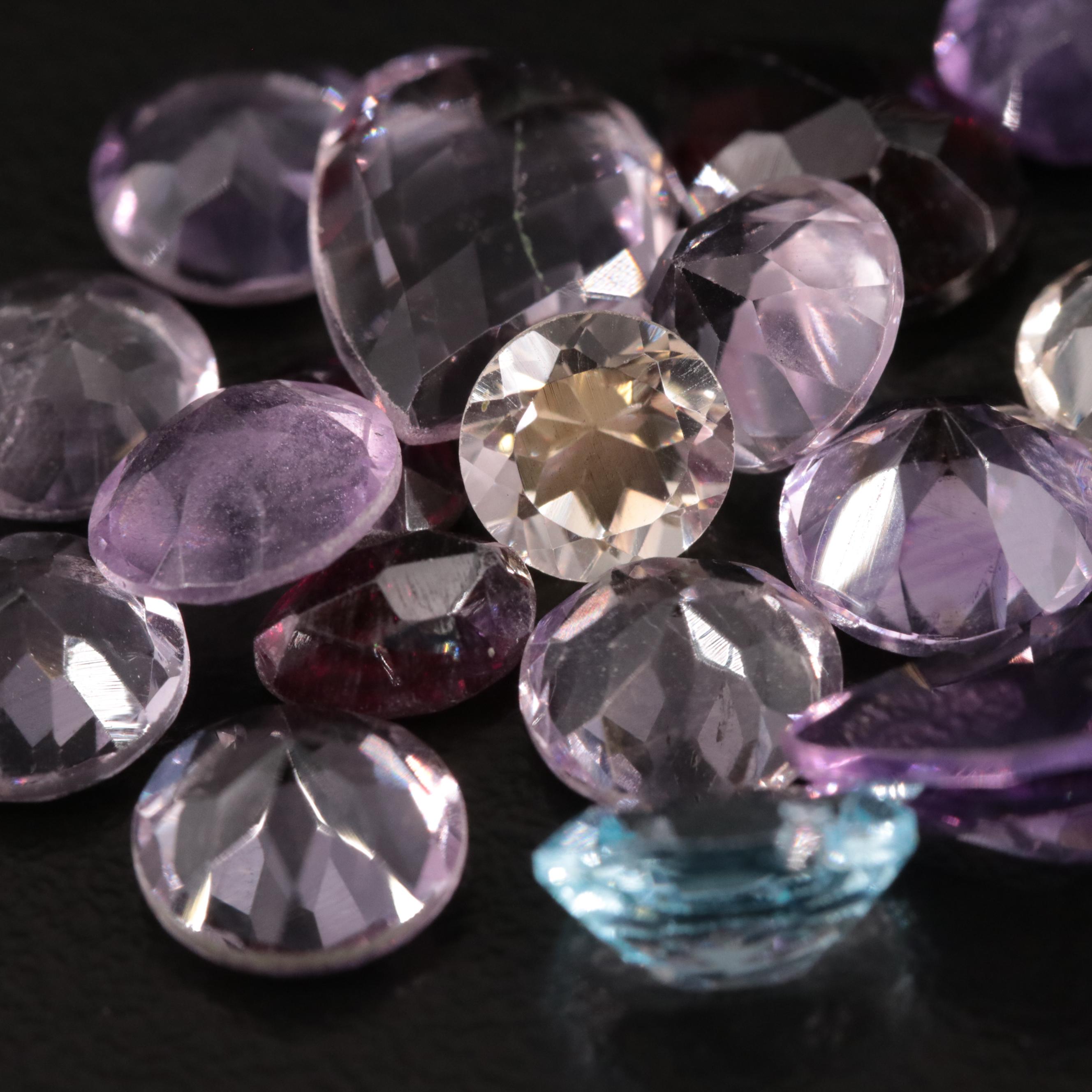 Loose 21.82 CTW Amethyst, Citrine and Garnet Lot