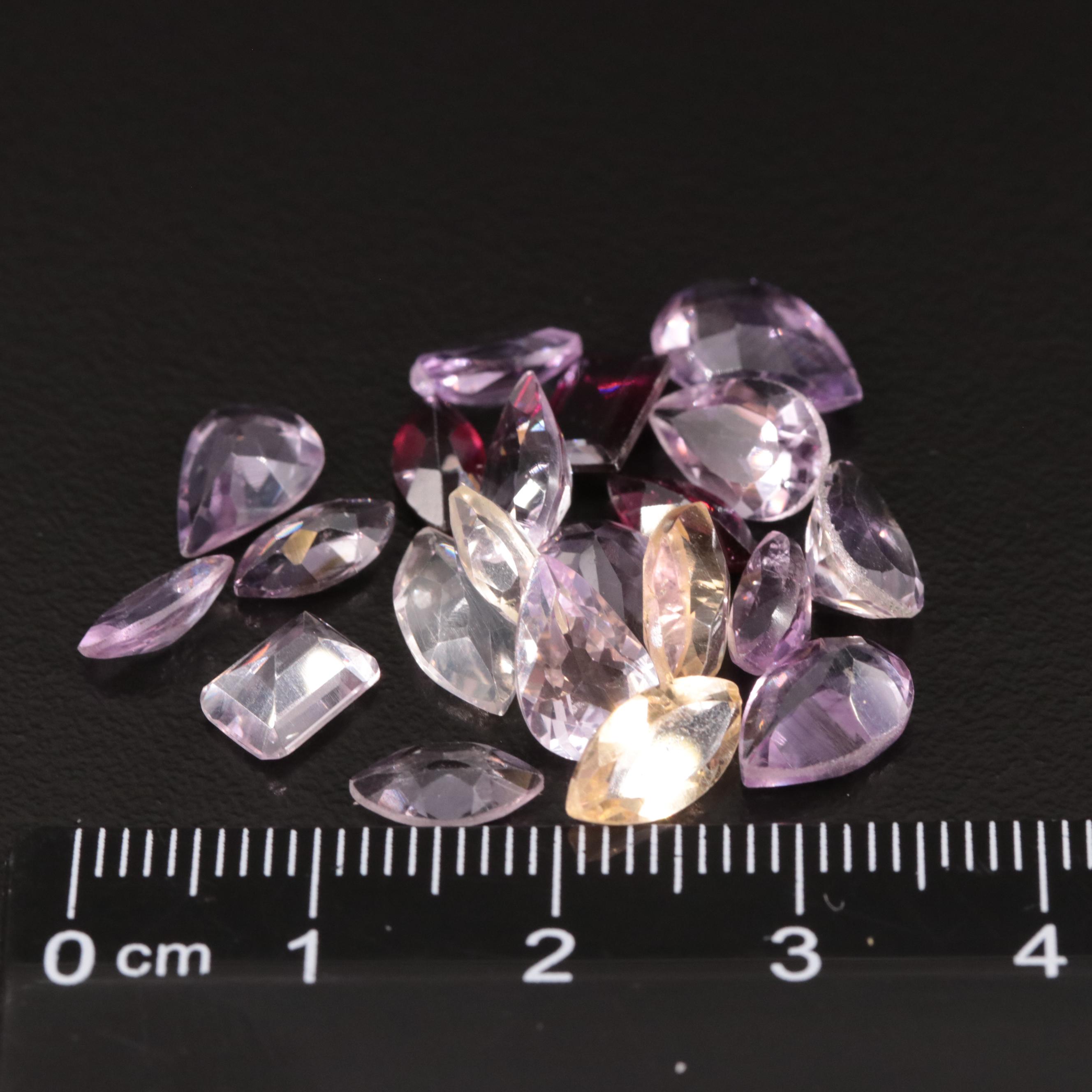 Loose 18.57 CTW Amethyst, Citrine and Garnet Lot