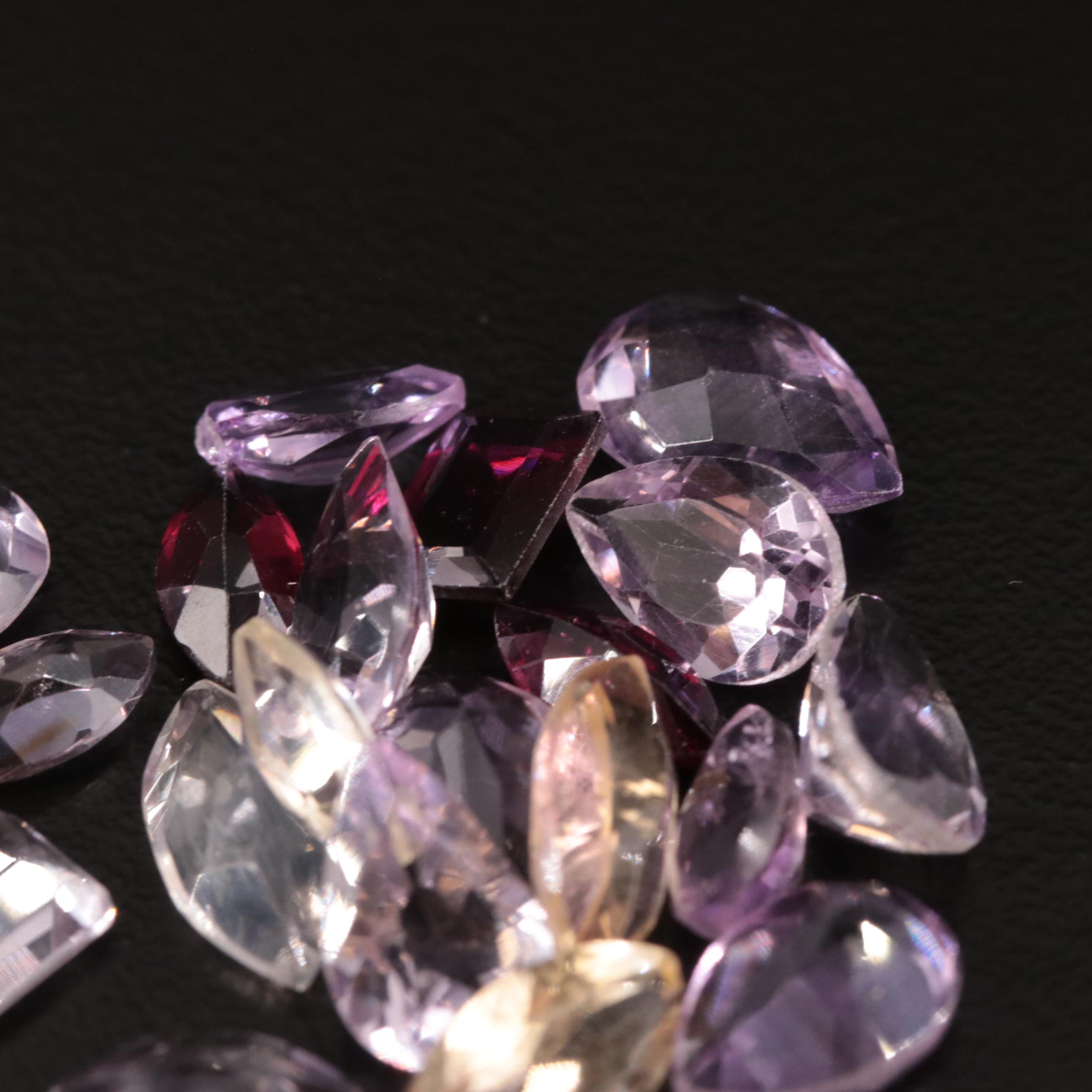 Loose 18.57 CTW Amethyst, Citrine and Garnet Lot