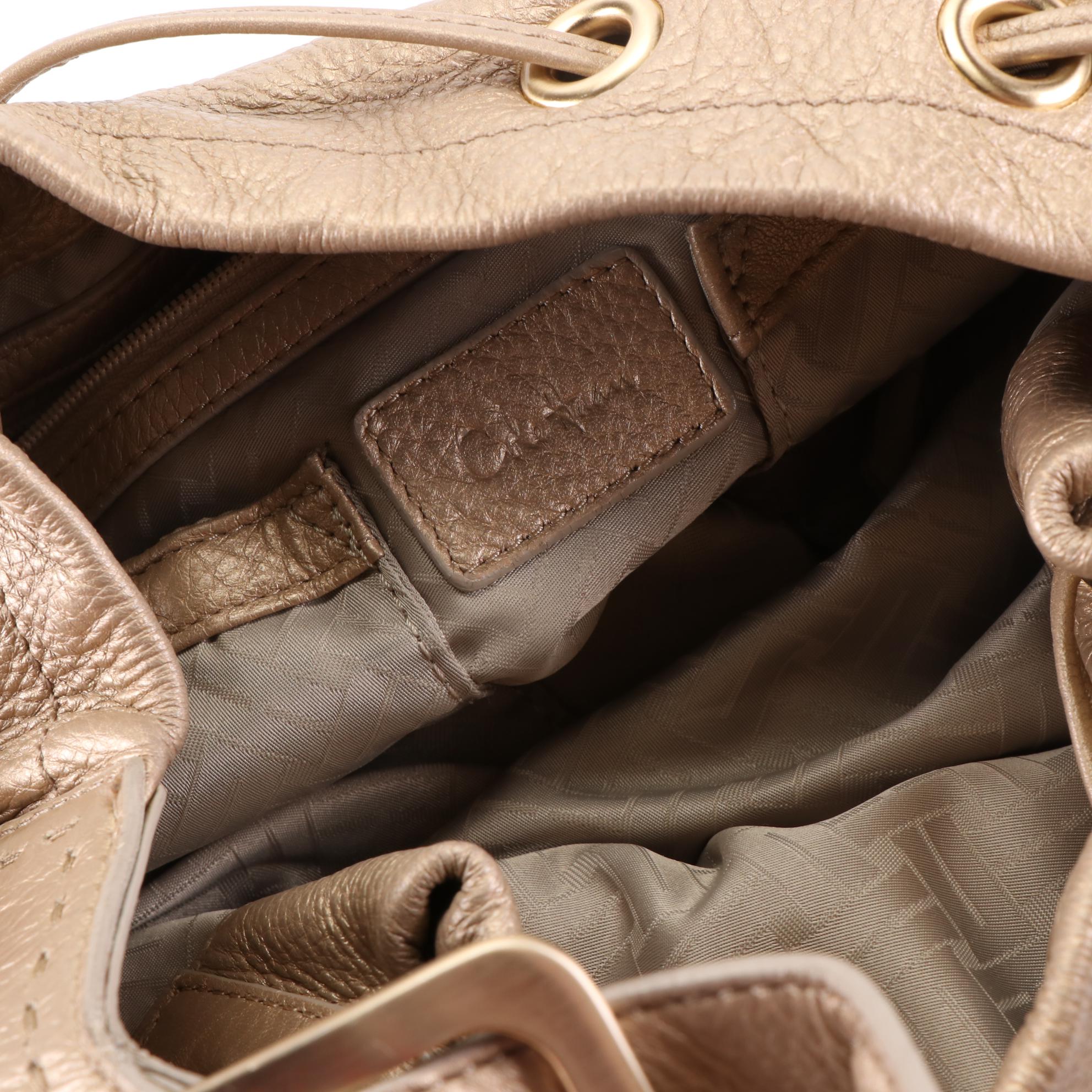 Cole Haan Drawstring Shoulder Bag in Metallic Gold Grain Leather