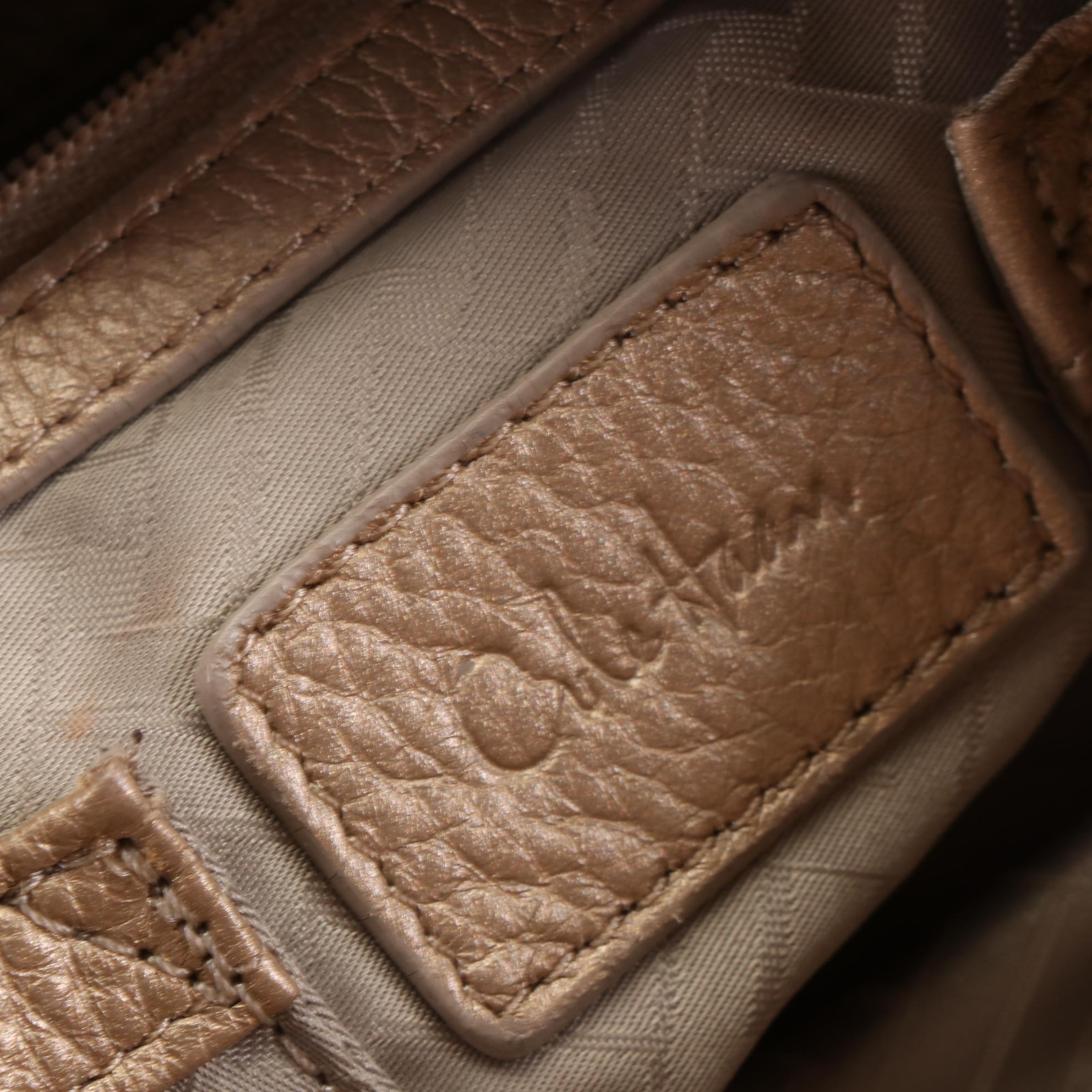 Cole Haan Drawstring Shoulder Bag in Metallic Gold Grain Leather