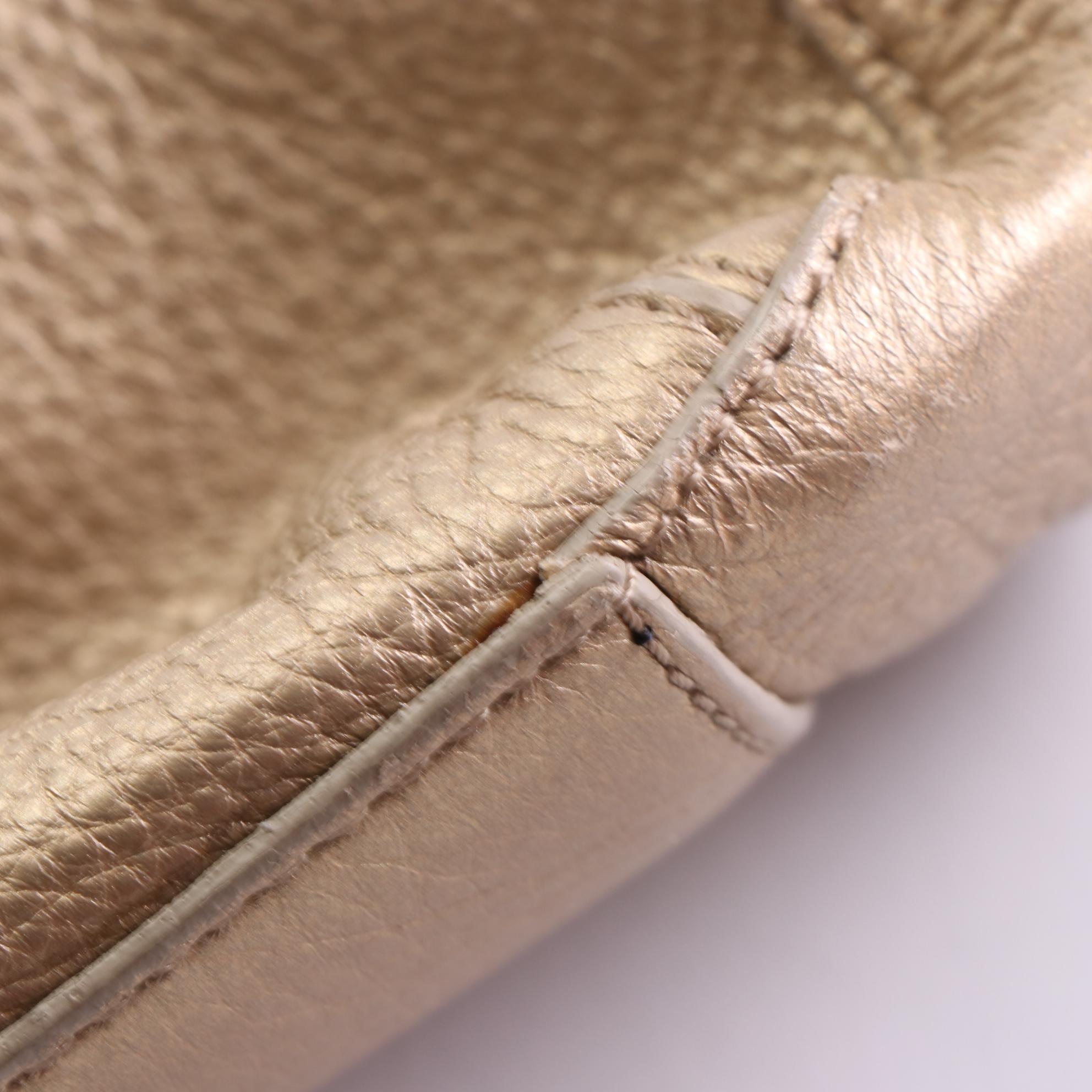 Cole Haan Drawstring Shoulder Bag in Metallic Gold Grain Leather