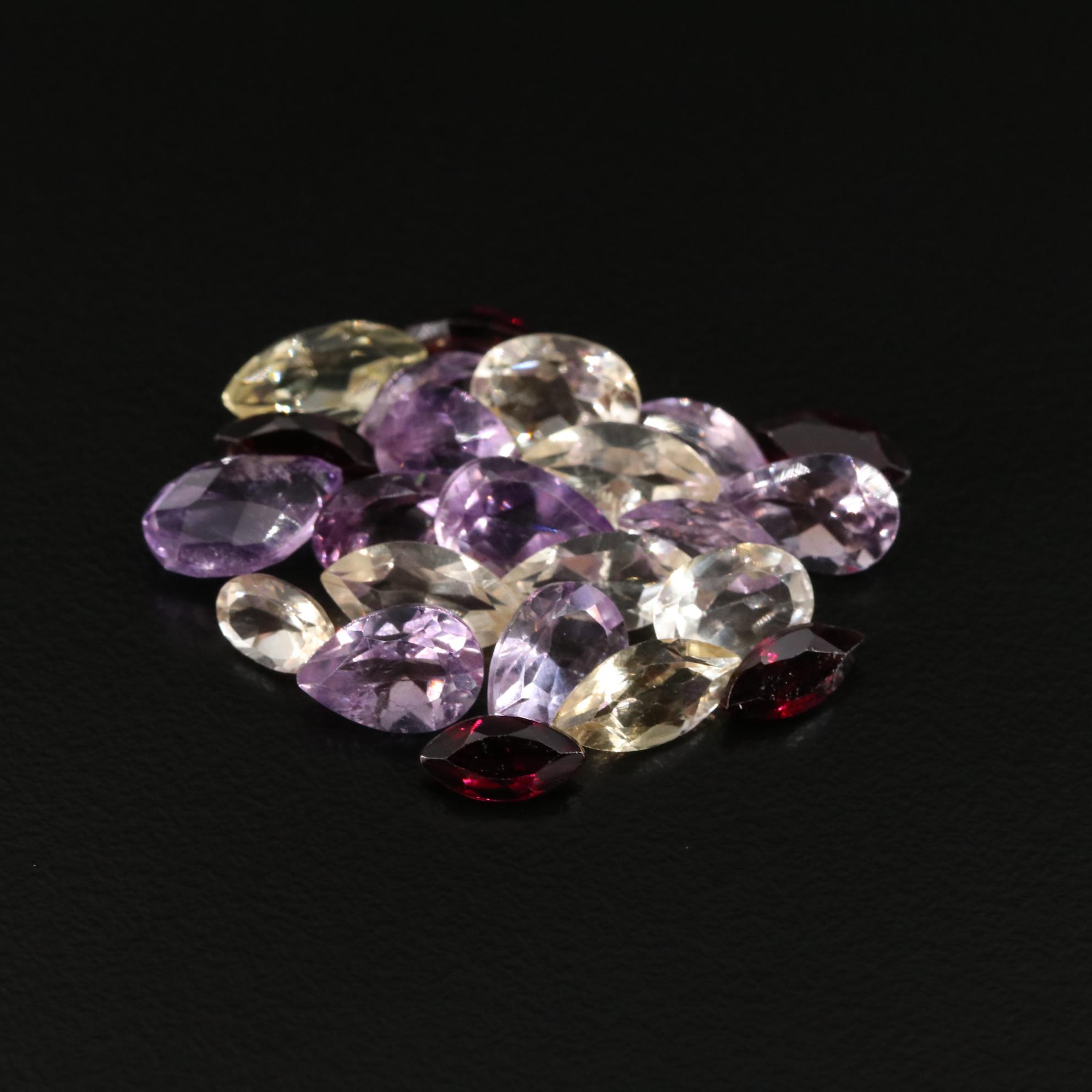 Loose 21.40 CTW Amethyst, Citrine, and Garnet Lot